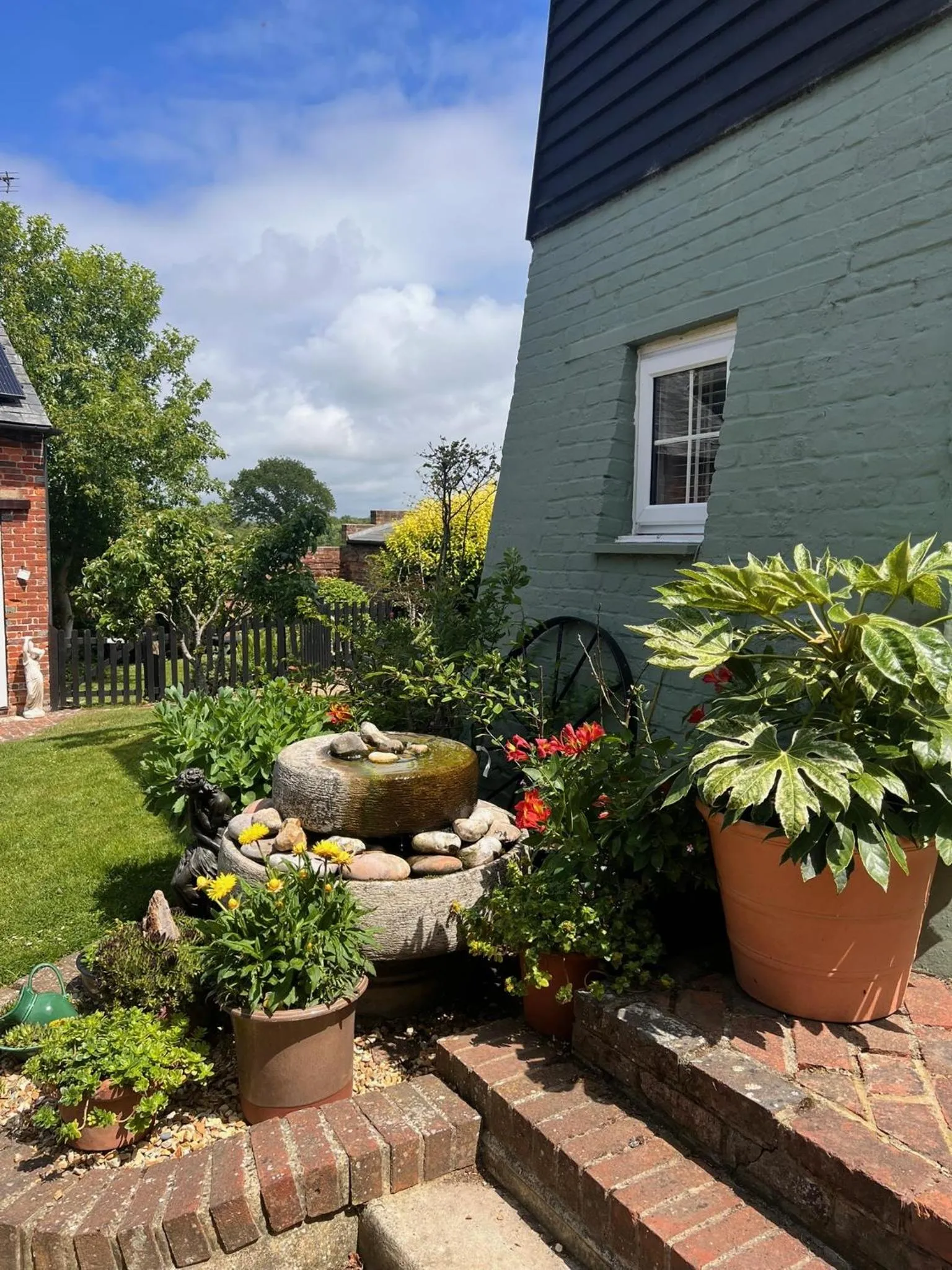 Garden view in Hunston Mill Self Catering Dog Stay For Free