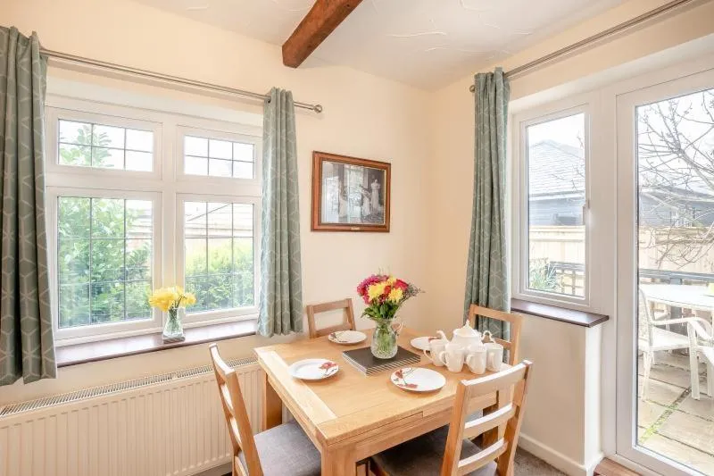 Dining area in Hunston Mill Self Catering Dog Stay For Free