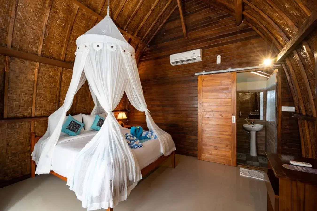Bed in Sundi Ocean Bungalow by ABM Bed in Sundi Ocean Bungalow by ABM