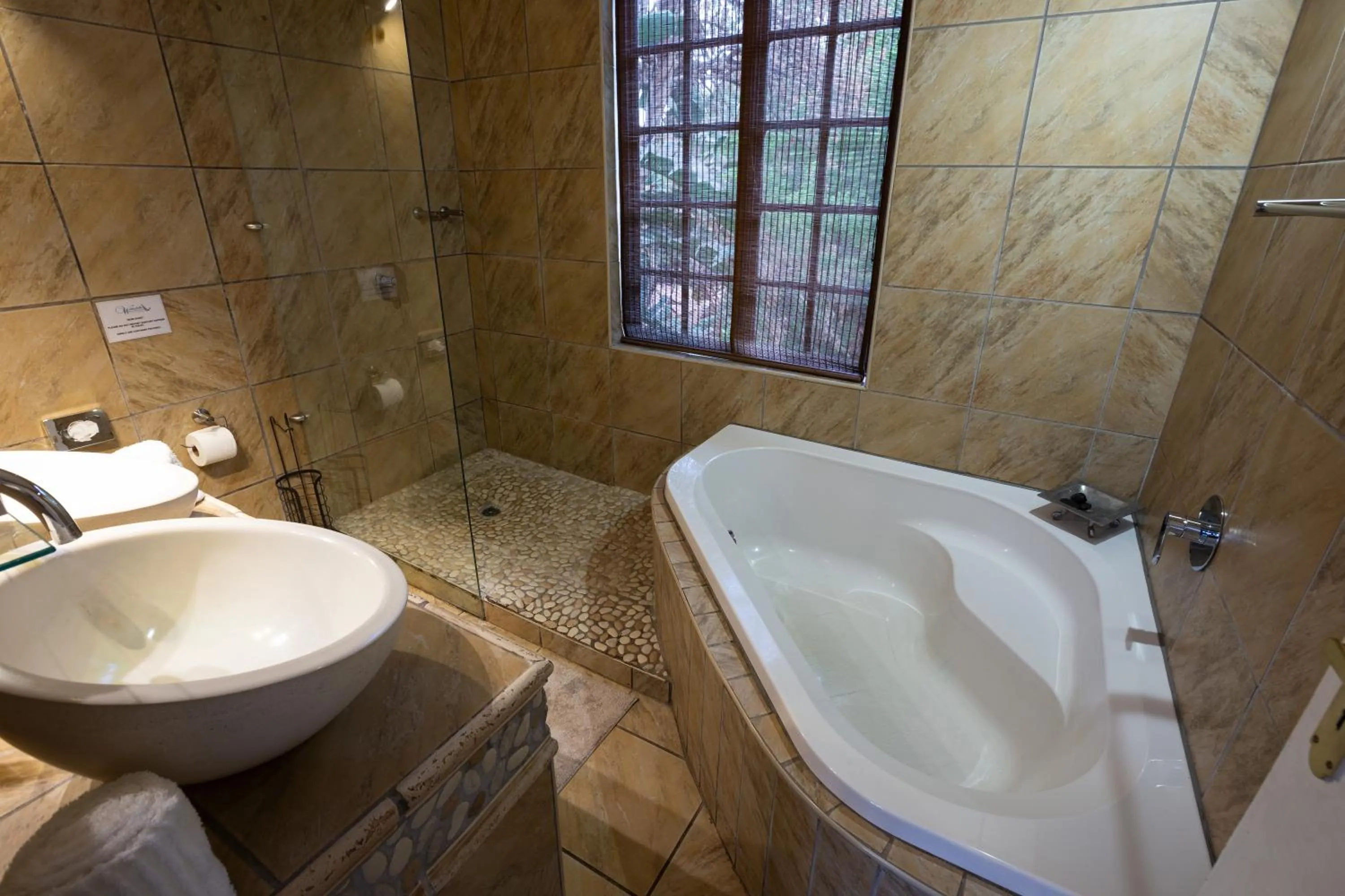 Bathroom in Waterfalls Boutique Hotel
