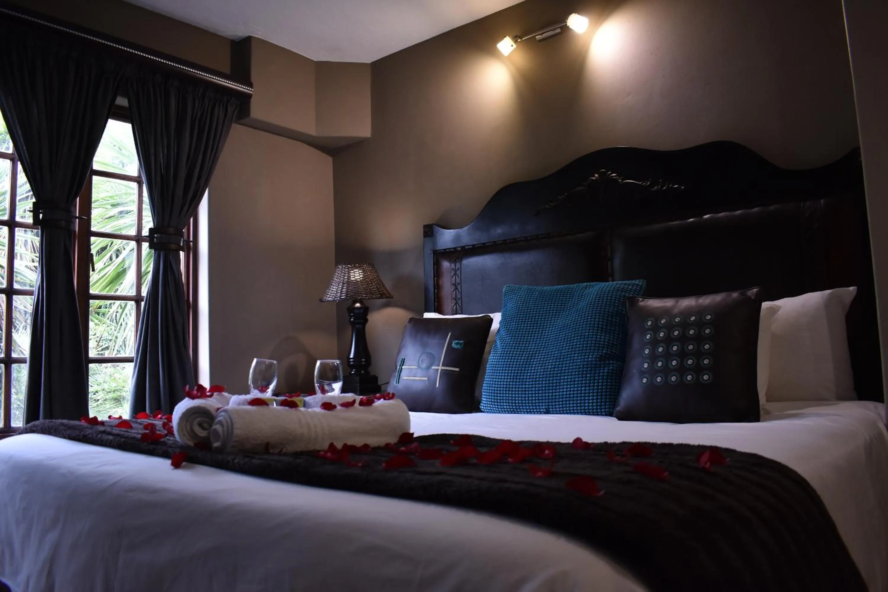 Bed in Waterfalls Boutique Hotel