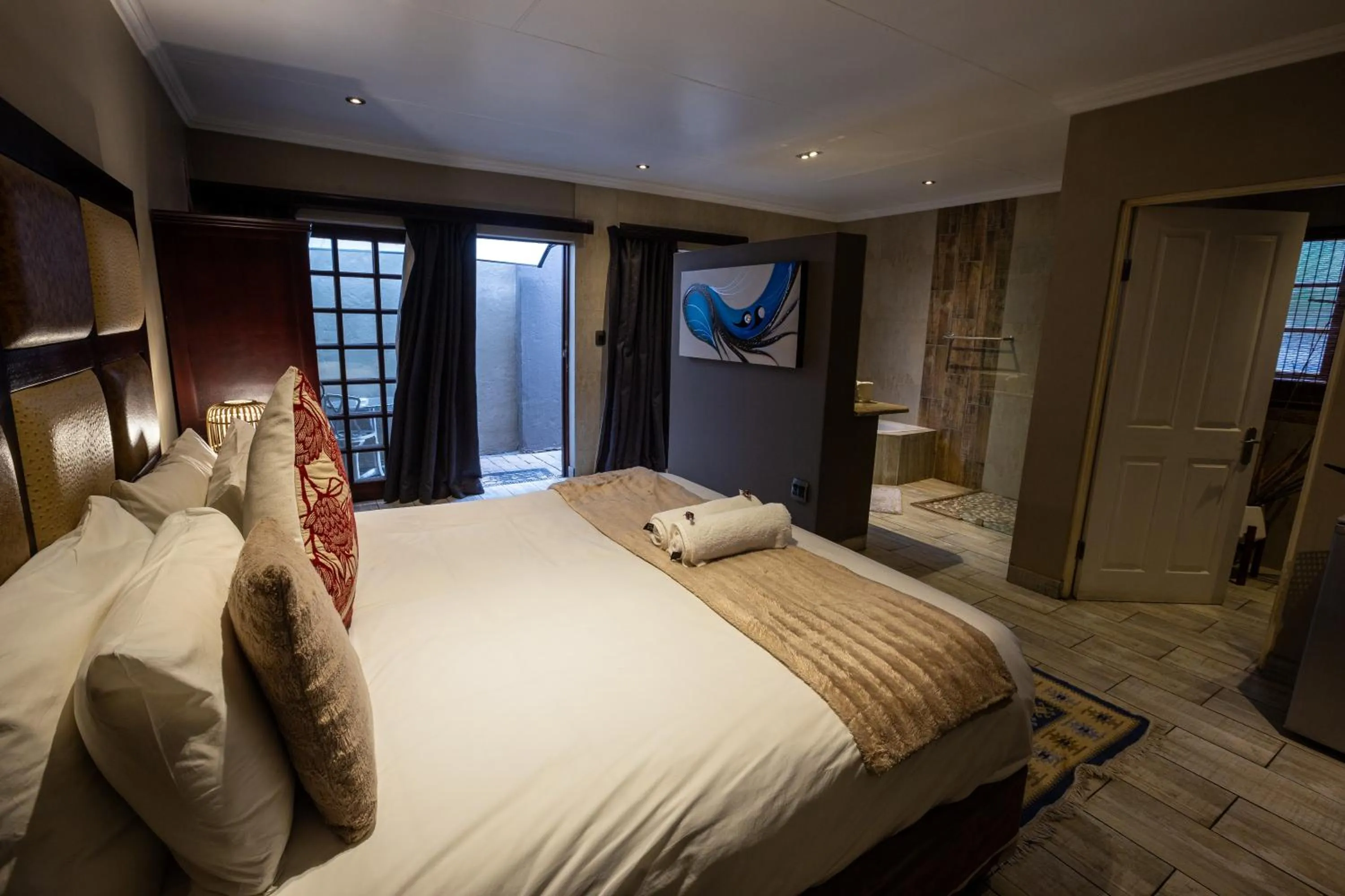 Photo of the whole room, Bed in Waterfalls Boutique Hotel