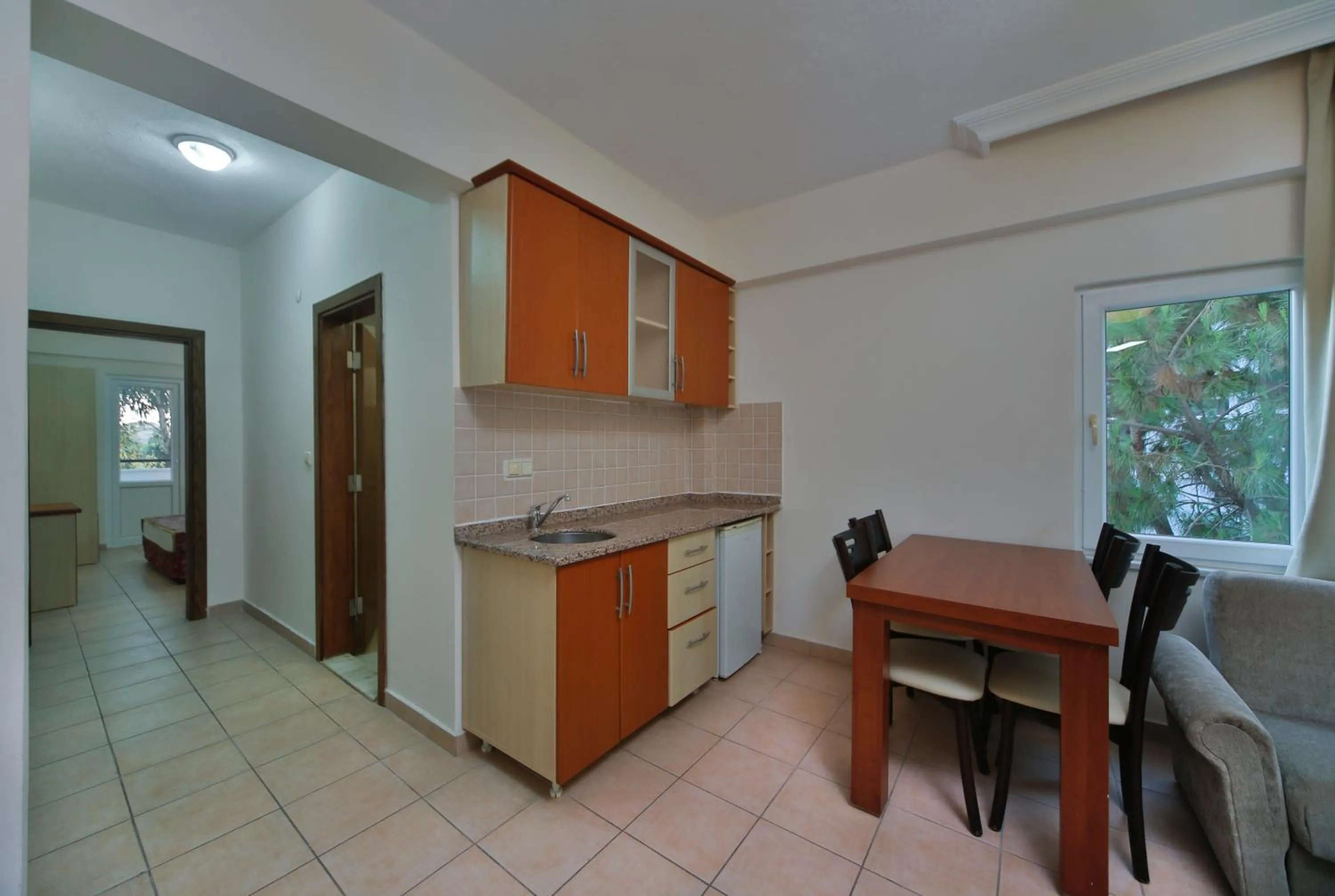 Kitchen or kitchenette in Irem Garden Hotel & Apartments