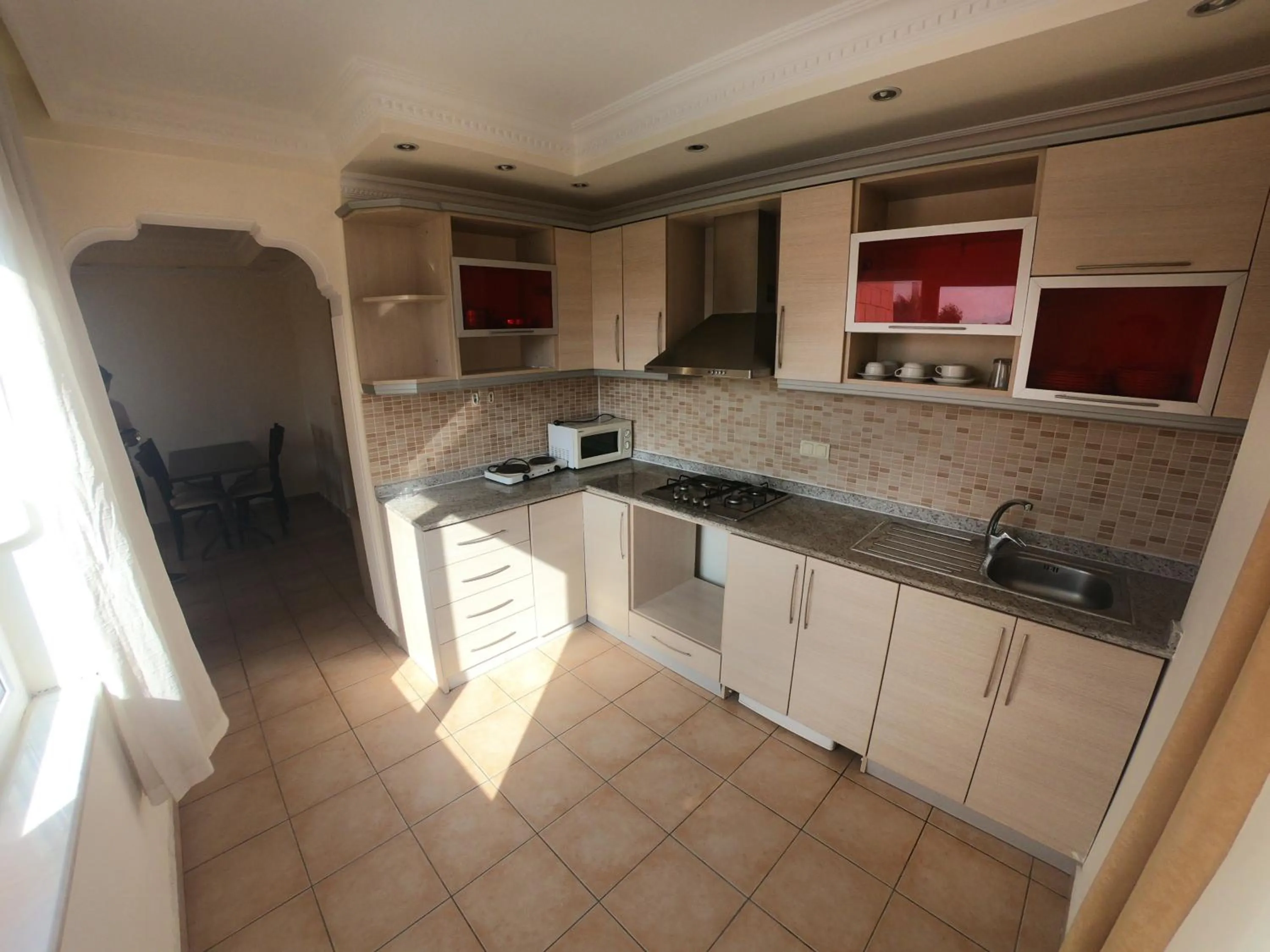 Kitchen or kitchenette in Irem Garden Hotel & Apartments