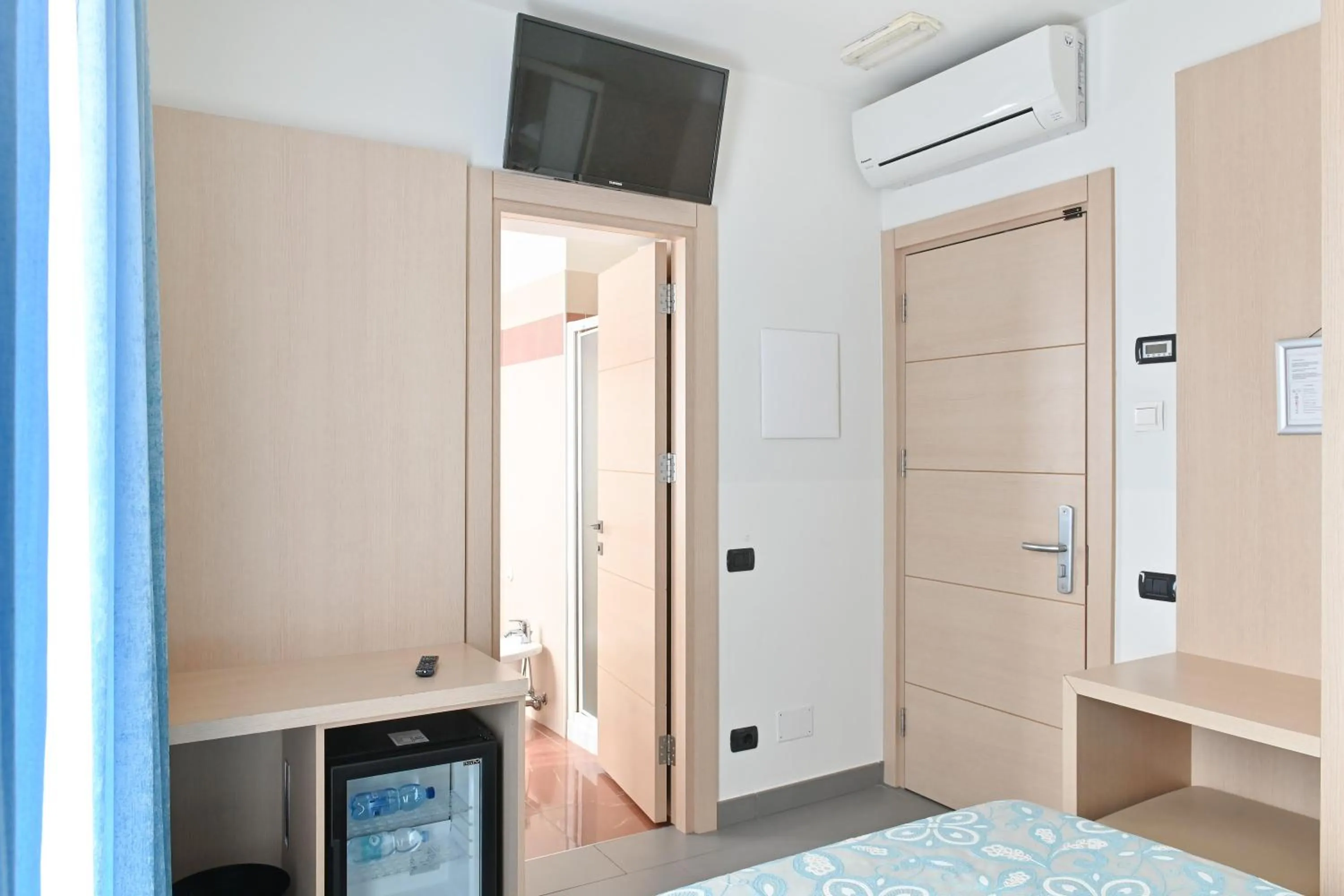 TV and multimedia, Bed in Hotel Marco's