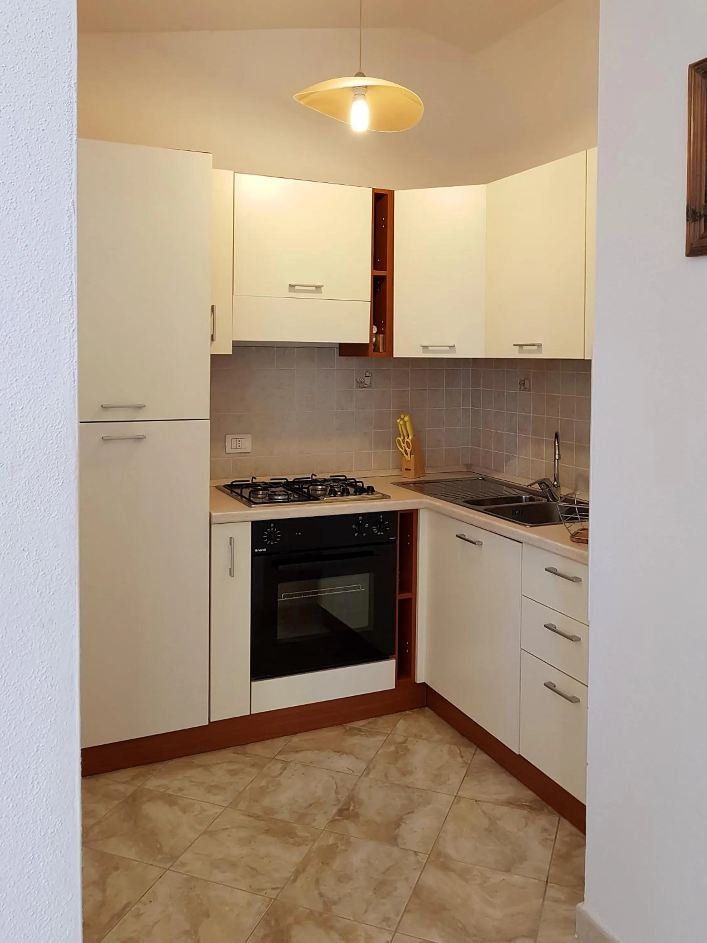 Kitchen or kitchenette in villette baia