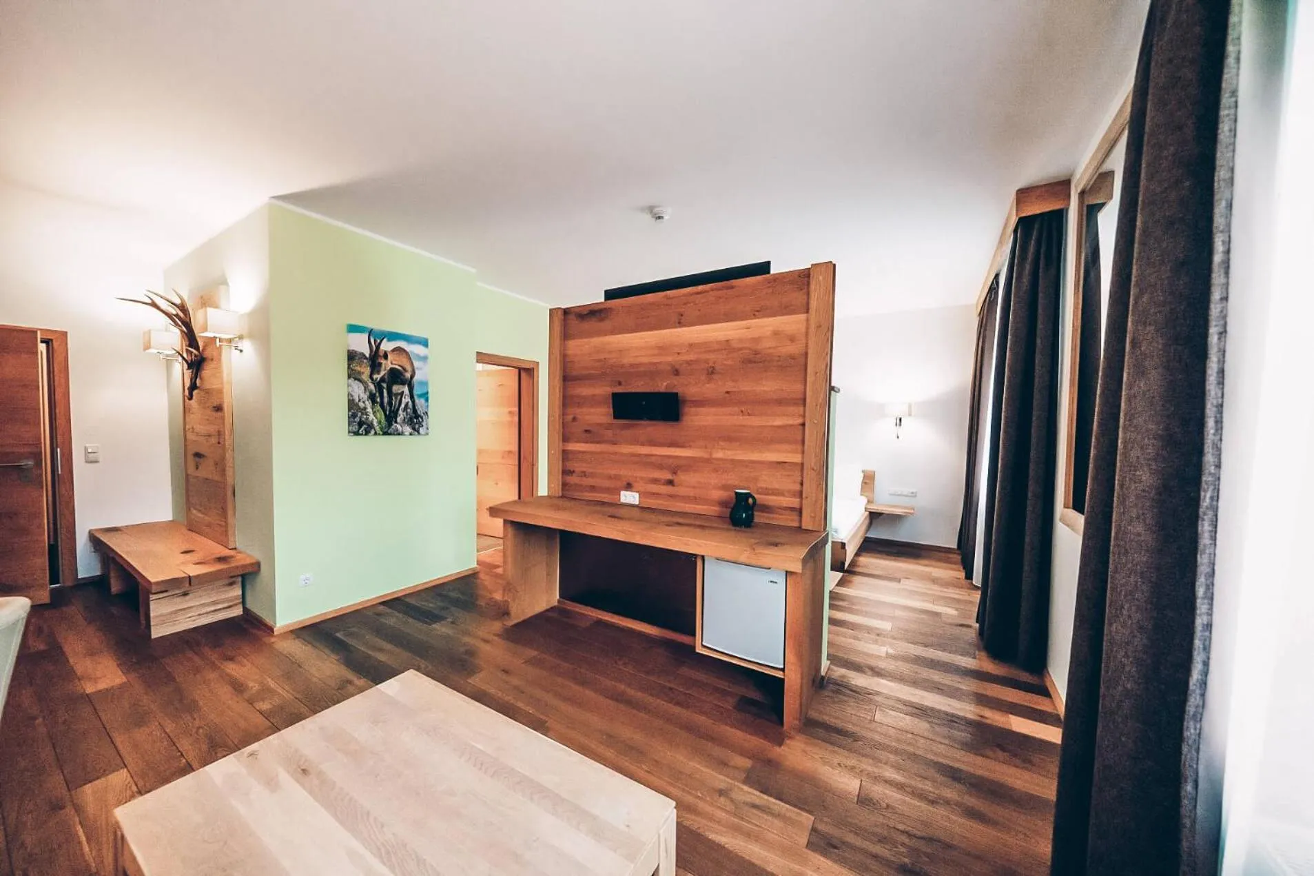 Living room, Bed in Aktivhotel Wildschütz