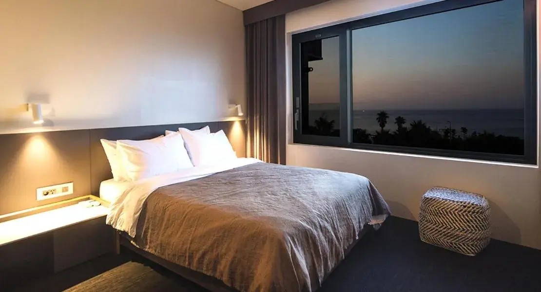 Bed in Jeju Bricks Hotel Bed in Jeju Bricks Hotel