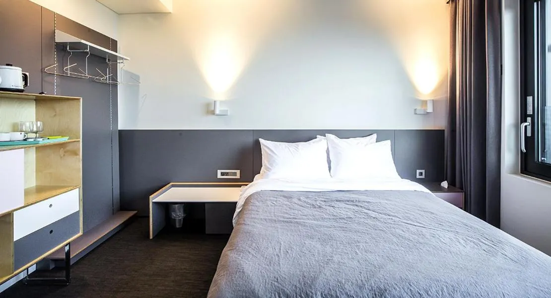 Bed in Jeju Bricks Hotel