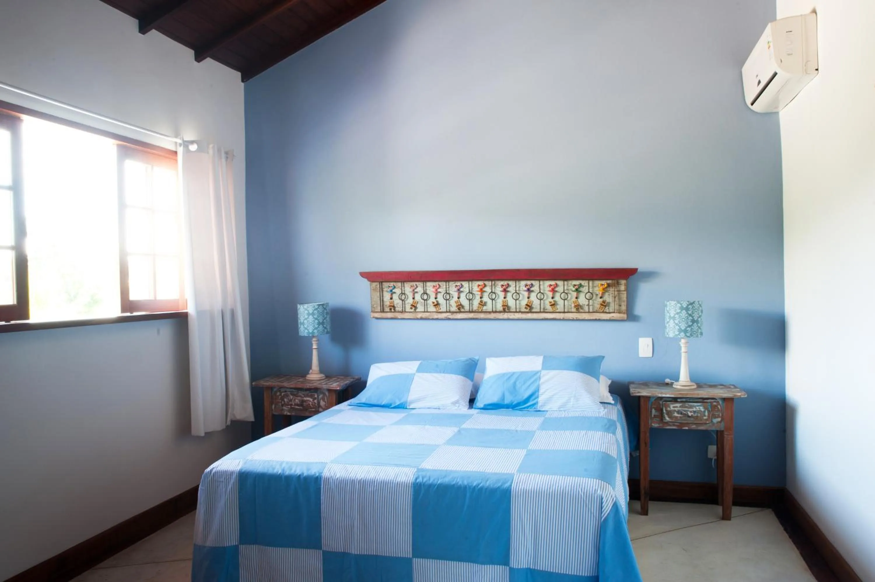 Bed in Recanto das Andorinhas Studios