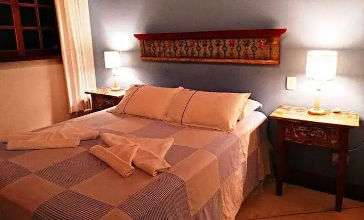 Bed in Recanto das Andorinhas Studios Bed in Recanto das Andorinhas Studios
