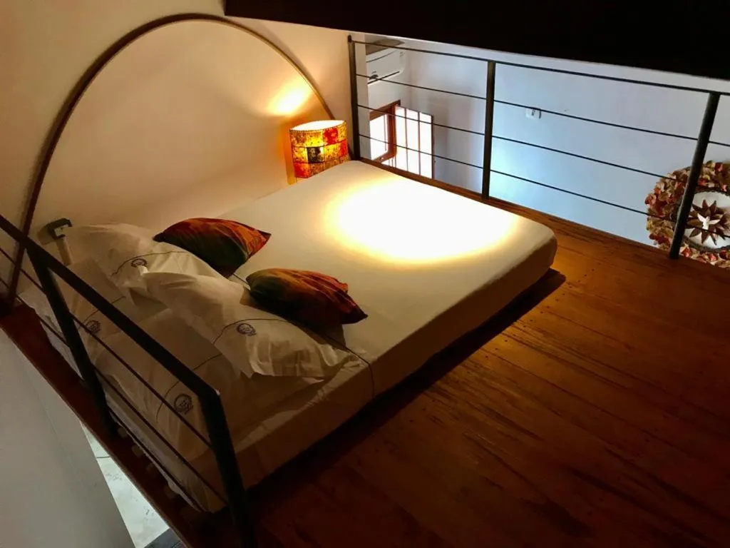 Bed in Recanto das Andorinhas Studios