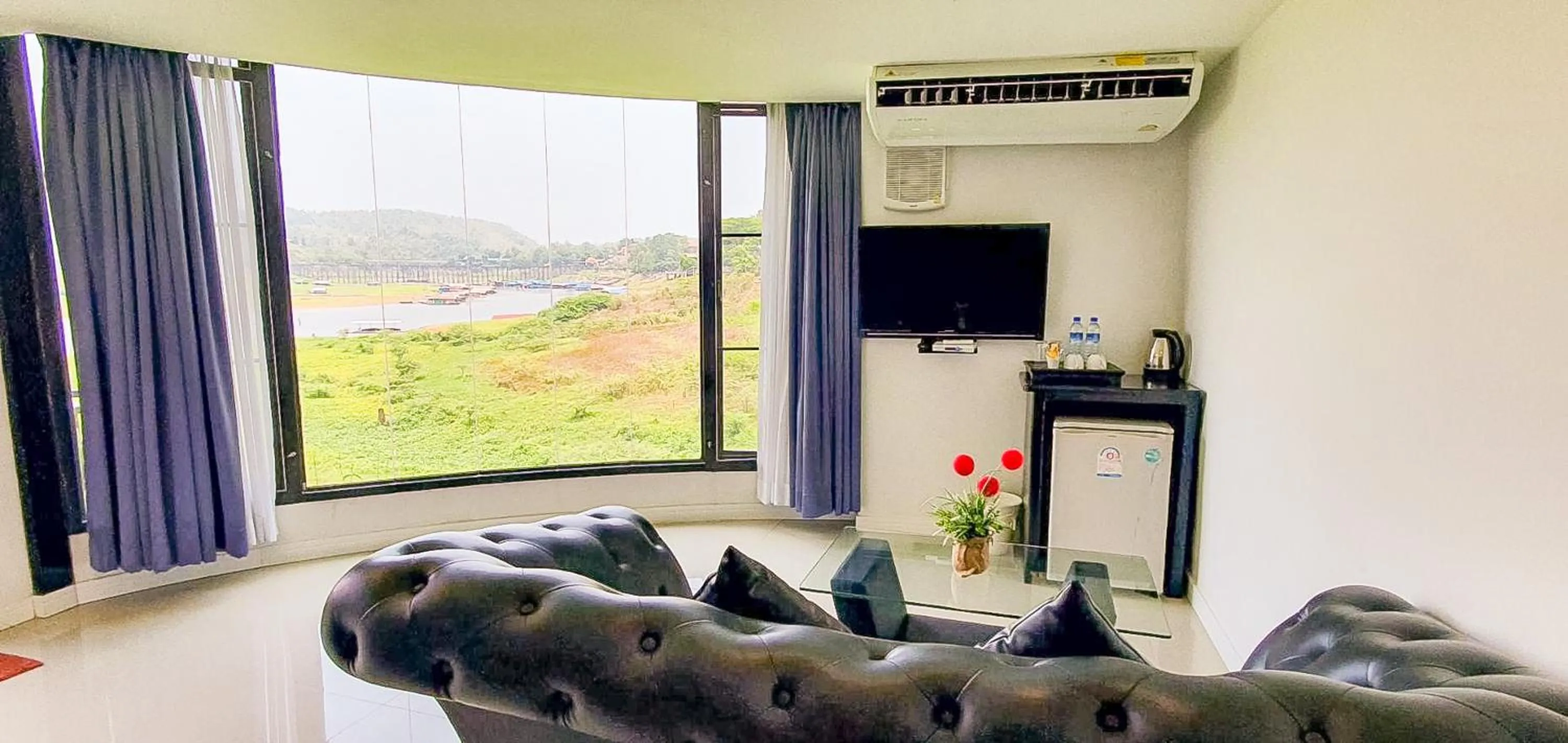 Living room in Phornpailin Riverside Resort