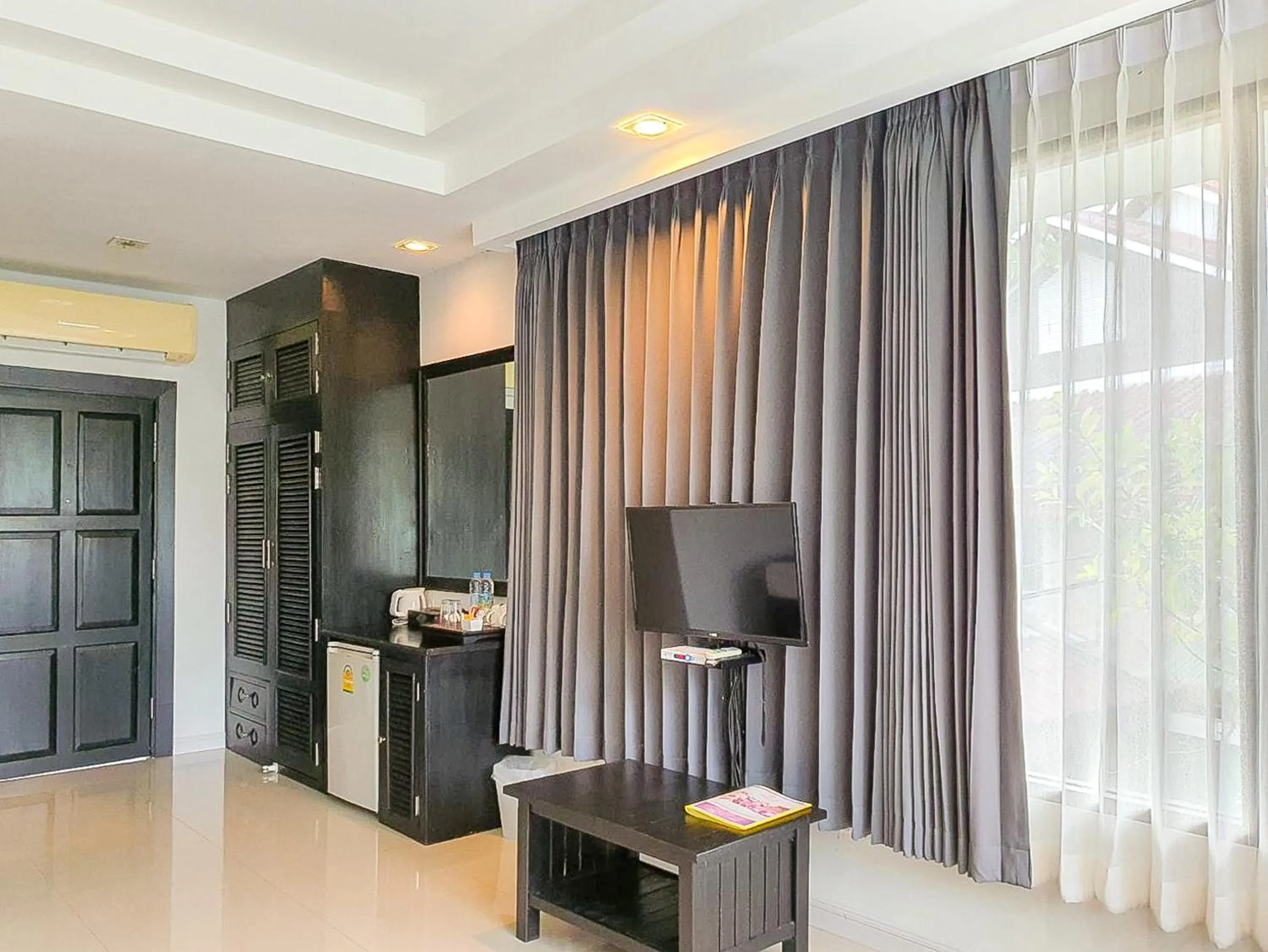 Living room in Phornpailin Riverside Resort