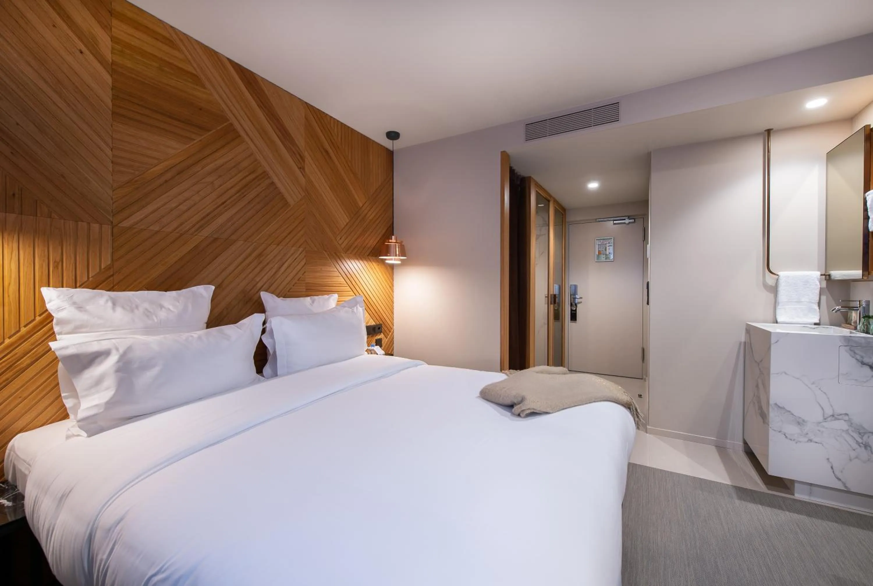 Bed in 9Hotel Paquis