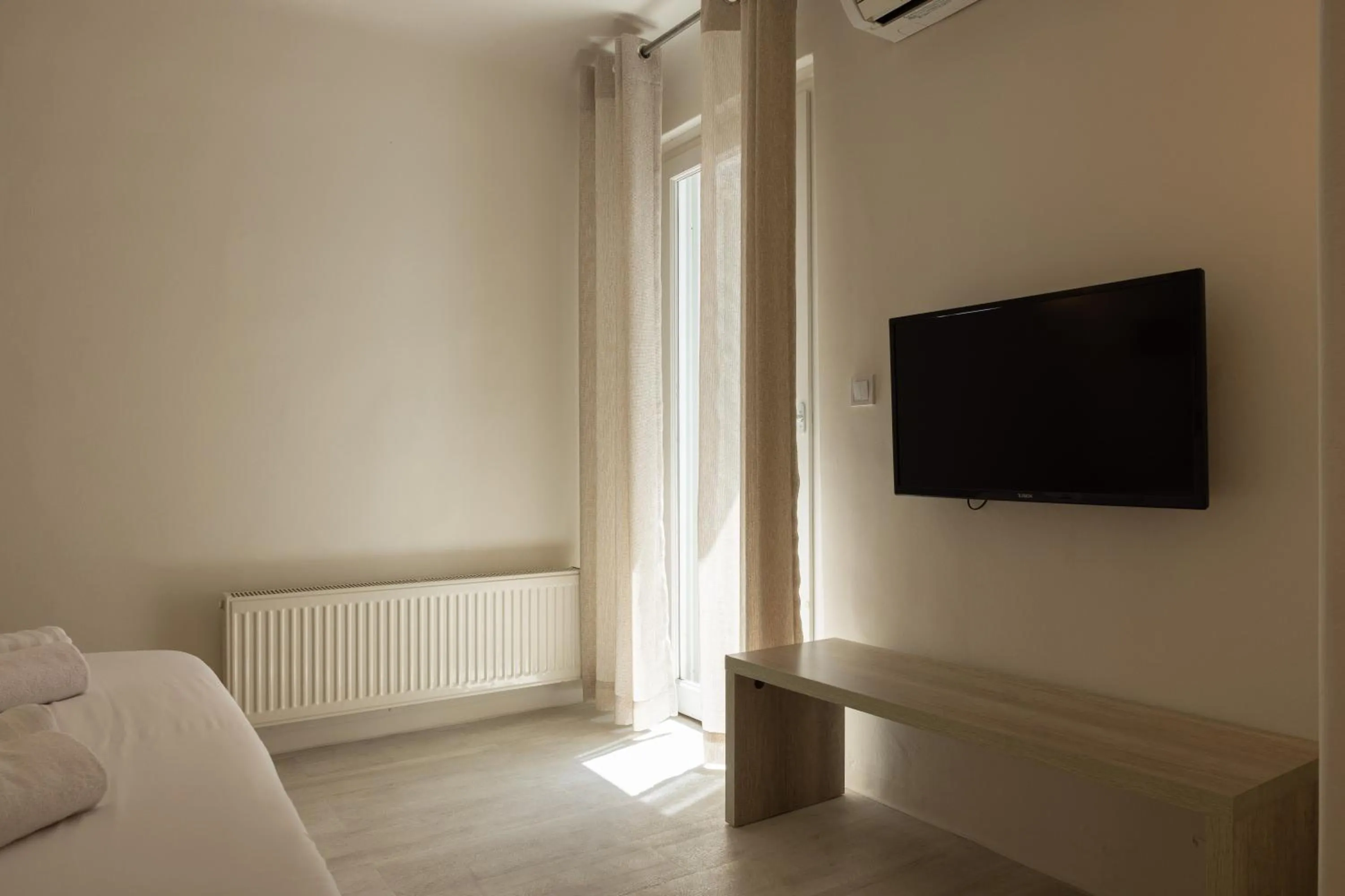 Bed in Amaris Mykonian Residence