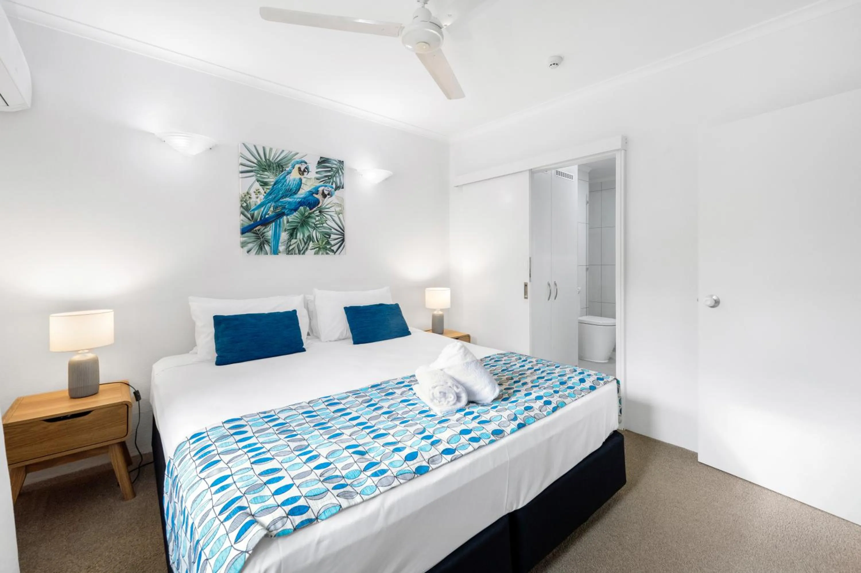 Bed in Marlin Waters Beachfront Apartments