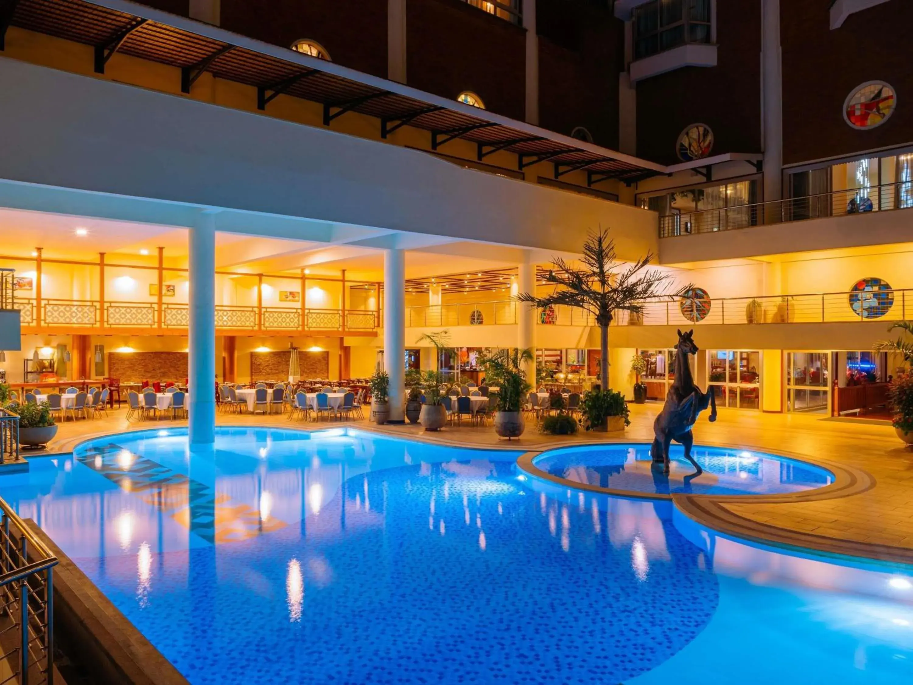 Pool view in Mövenpick Hotel & Residences Nairobi Pool view in Mövenpick Hotel & Residences Nairobi