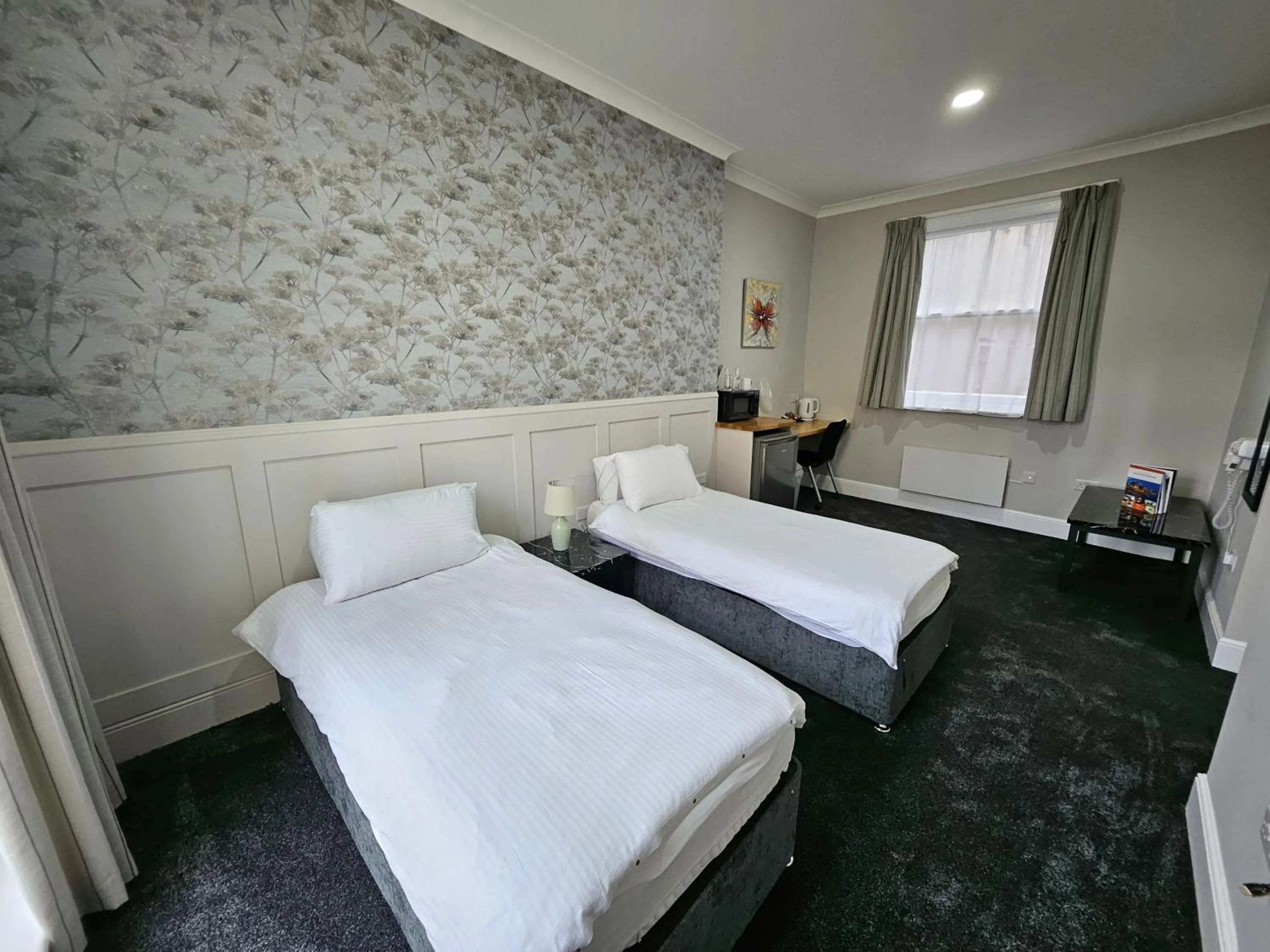 Bed in New County Hotel & Serviced Apartments by RoomsBooked