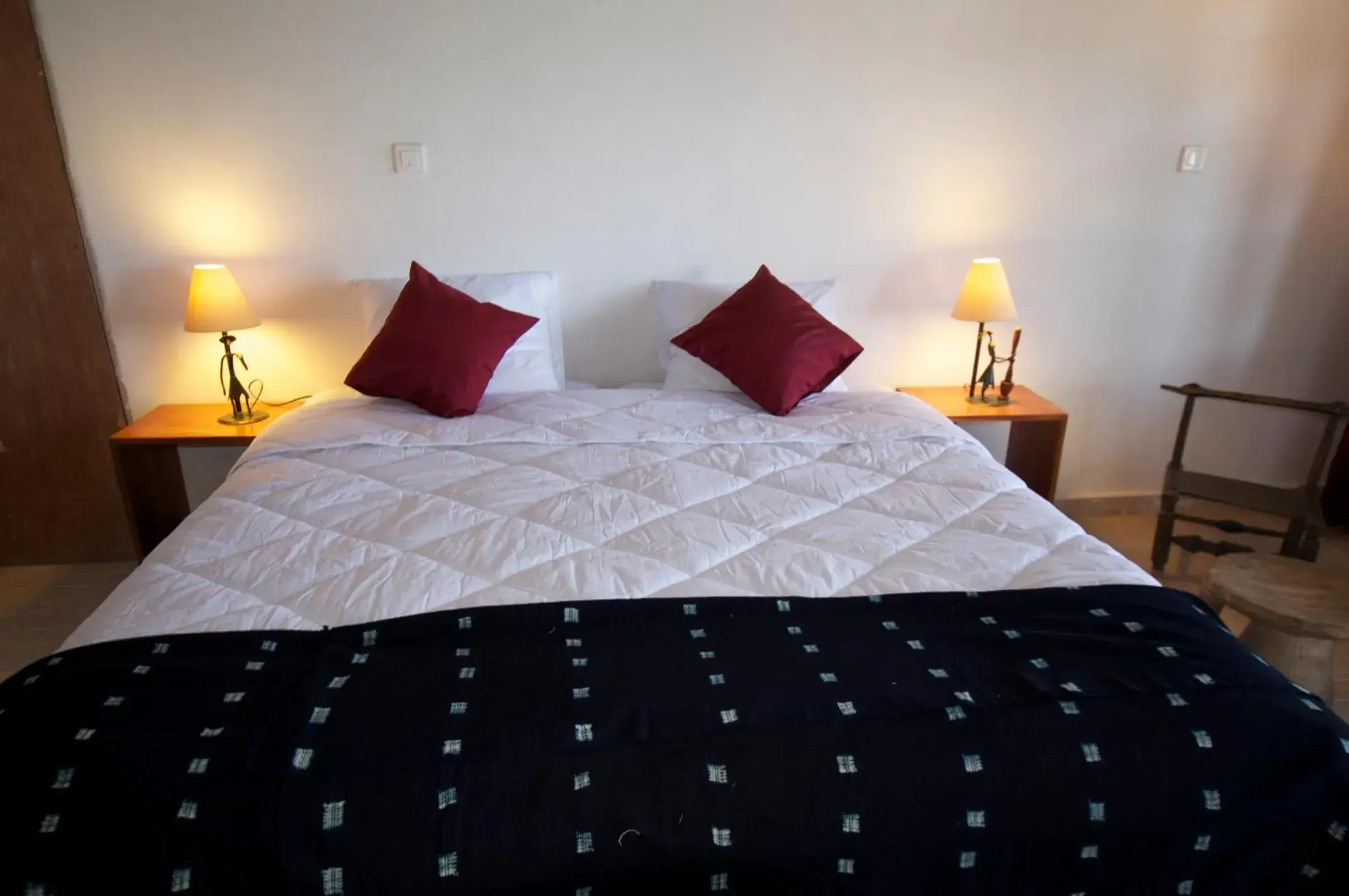 Bed in Hôtel Kadiandoumagne Bed in Hôtel Kadiandoumagne