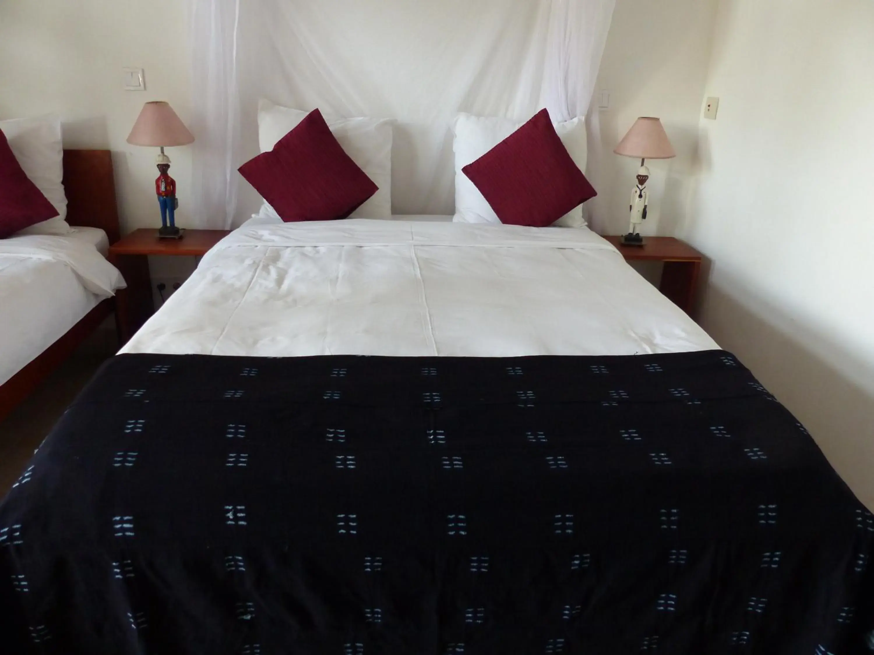 Bed in Hôtel Kadiandoumagne Bed in Hôtel Kadiandoumagne