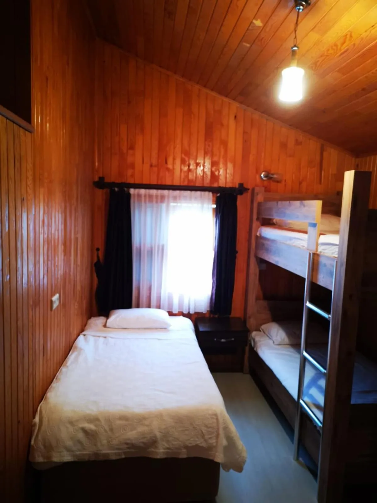 Bed in Cirali Zakkum Bungalow