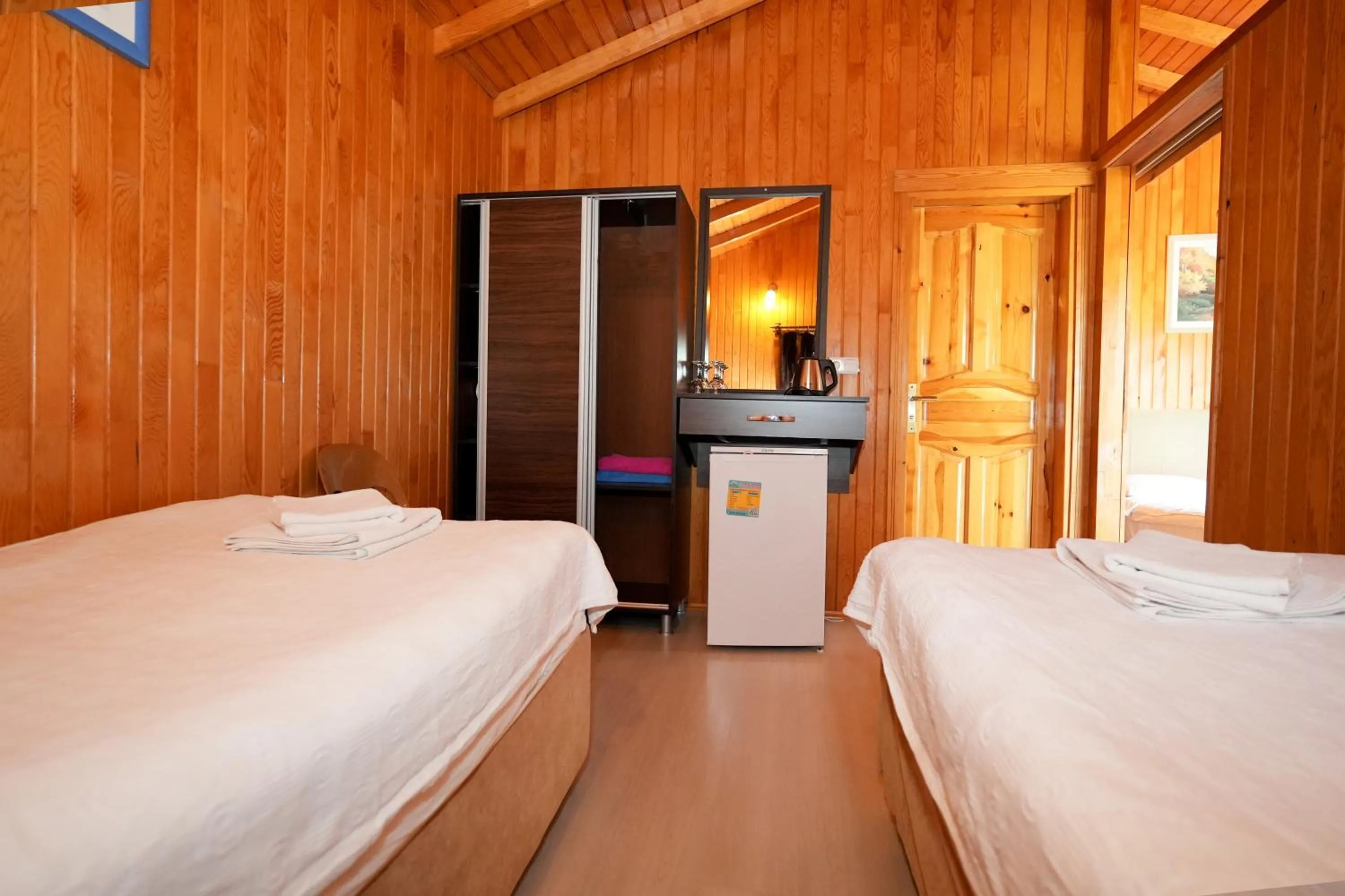 Bed in Cirali Zakkum Bungalow