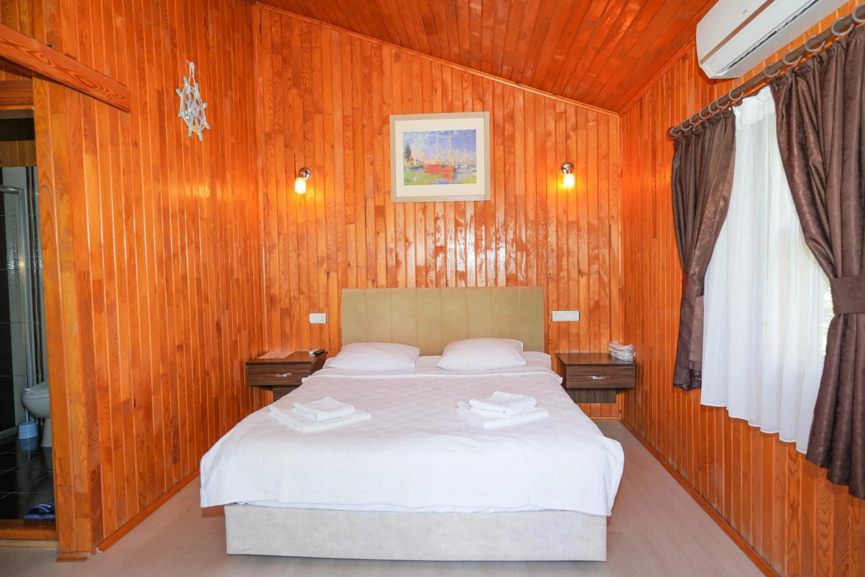 Bed in Cirali Zakkum Bungalow