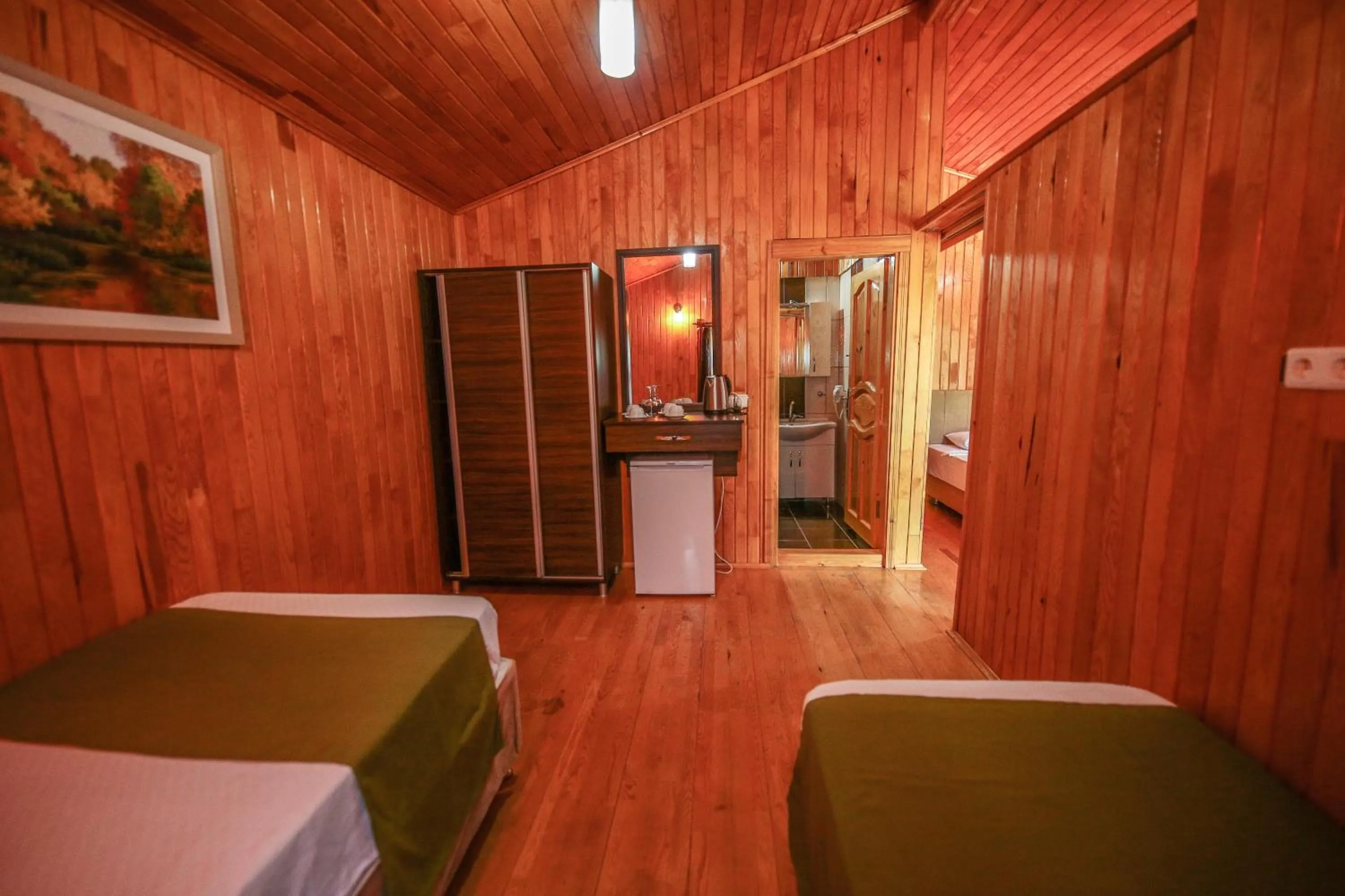 Bed in Cirali Zakkum Bungalow