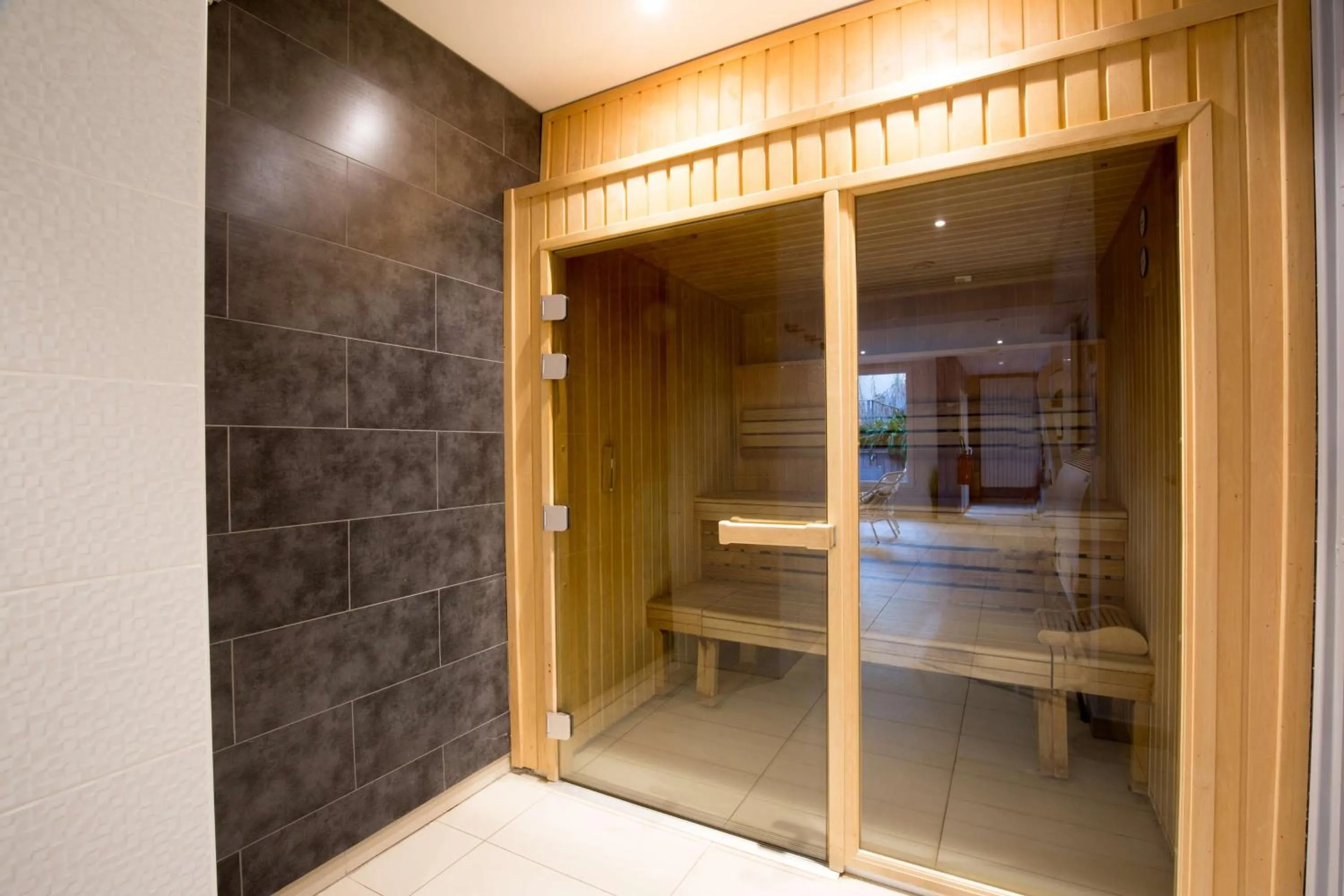 Sauna in Best Western Hôtel Garden and Spa
