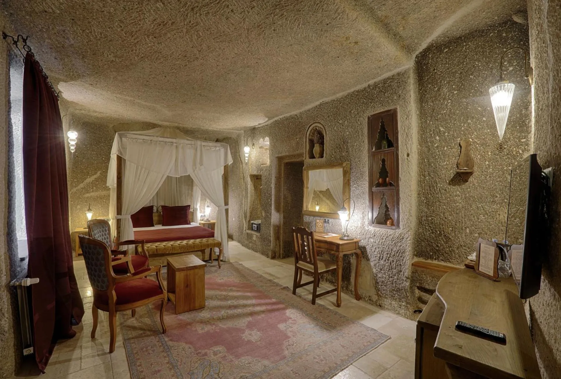 Bed in Hera Cave Suites