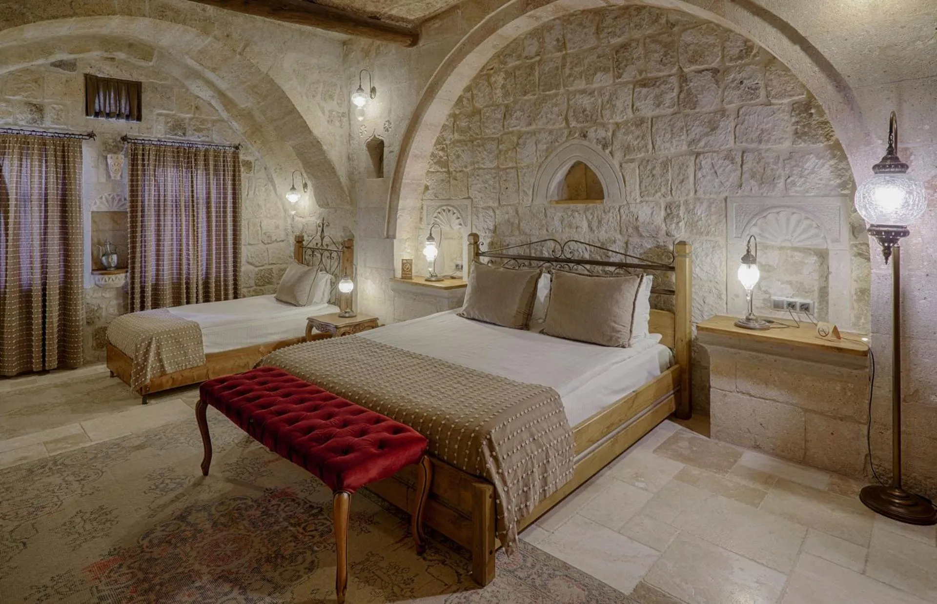 Bed in Hera Cave Suites