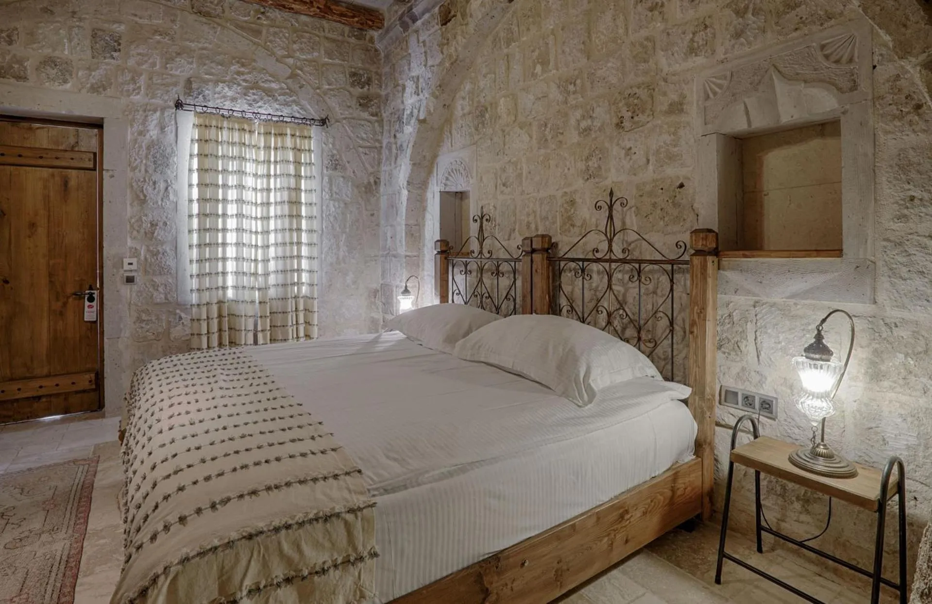 Bed in Hera Cave Suites