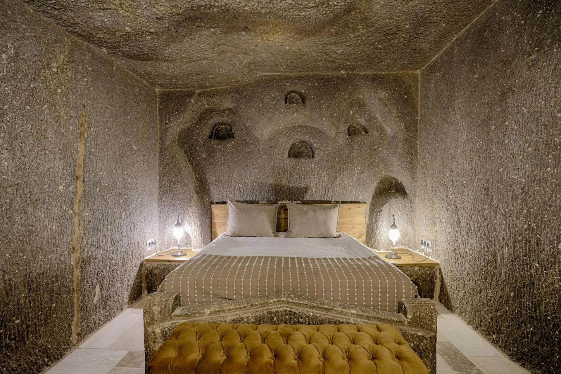 Bed in Hera Cave Suites