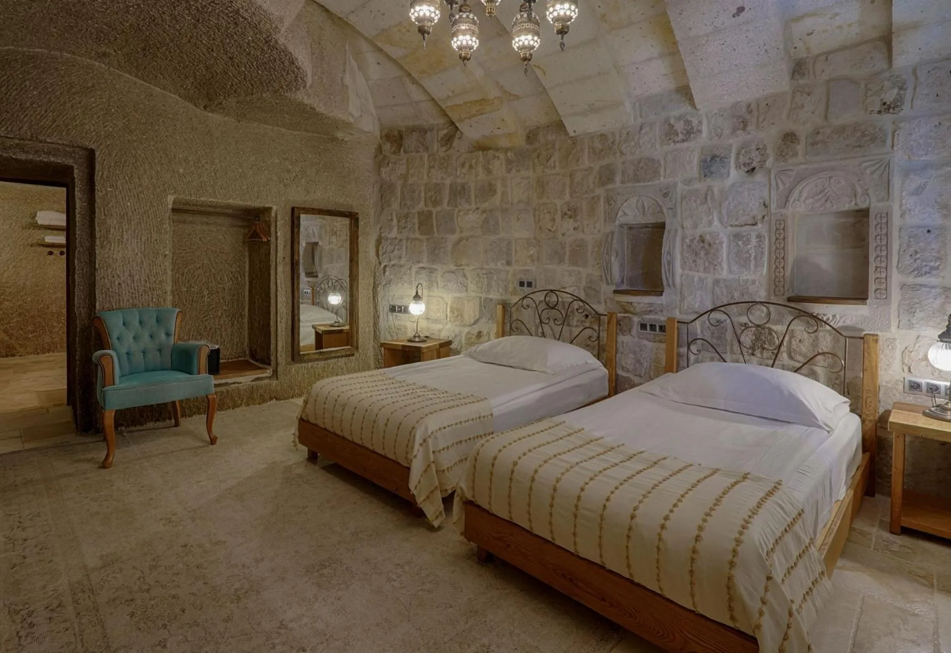Bed in Hera Cave Suites