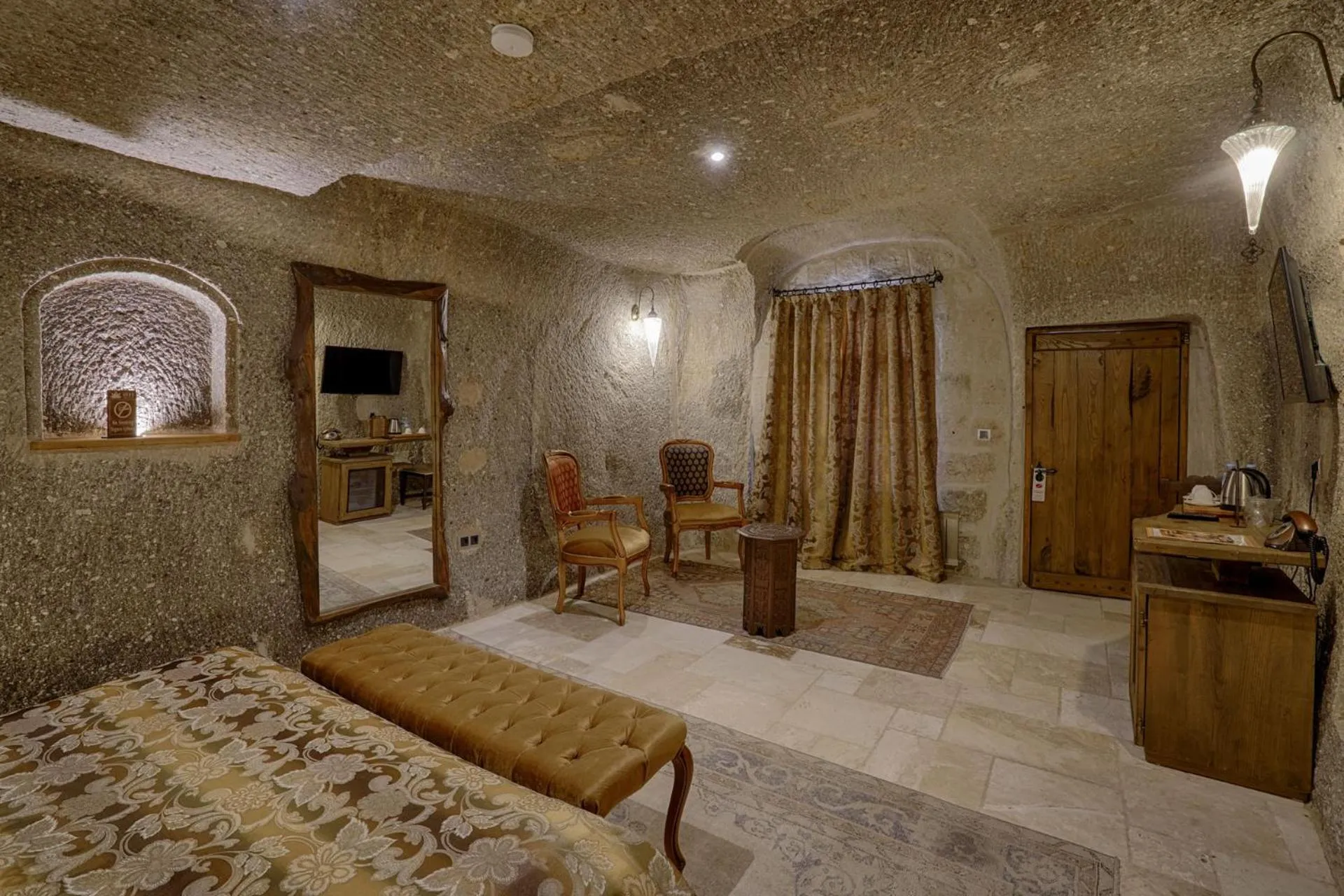 Seating area, Bed in Hera Cave Suites