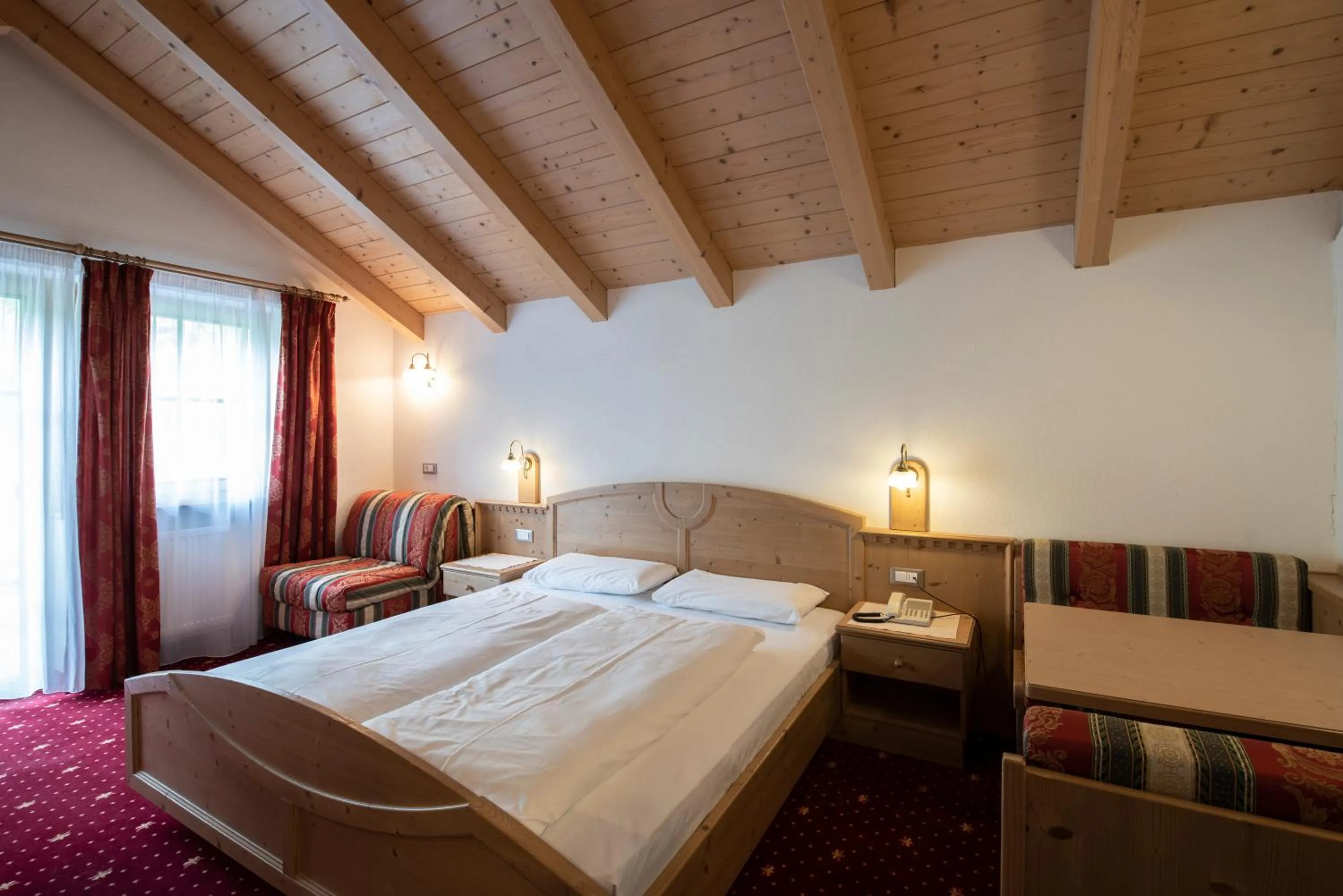 Photo of the whole room, Bed in Residence Mühlegg