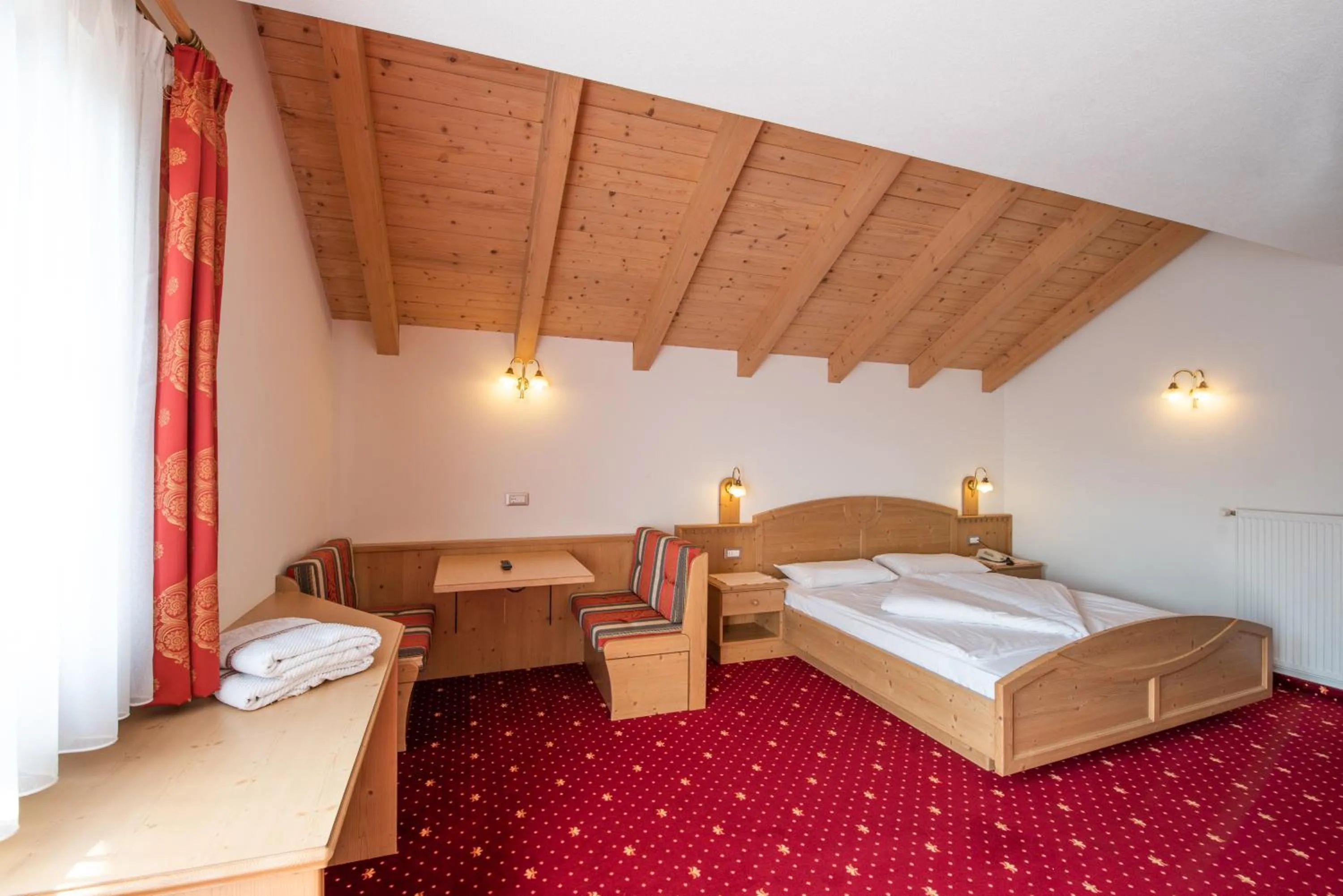 Photo of the whole room, Bed in Residence Mühlegg