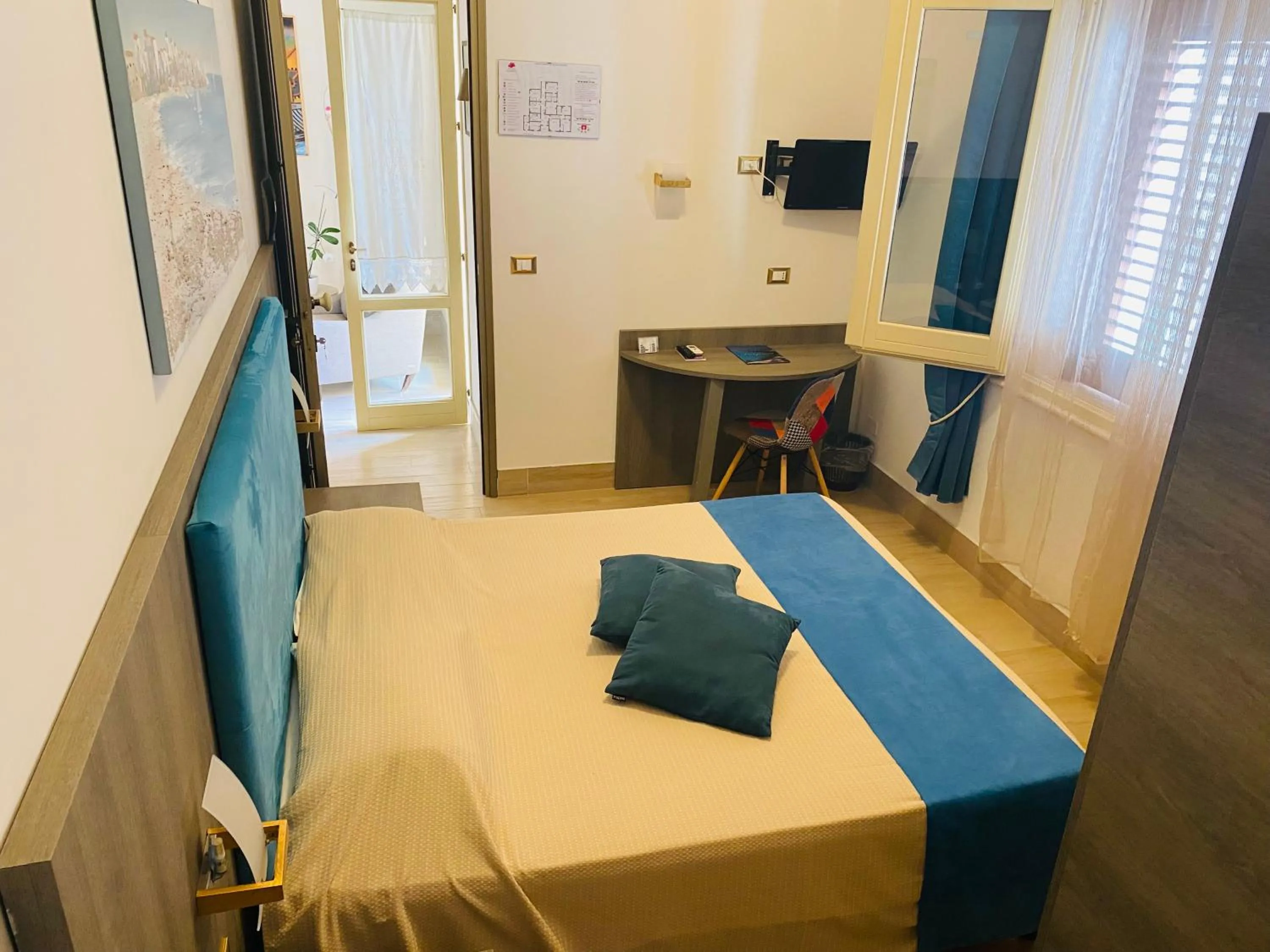 Bed in Albergo Bouganville