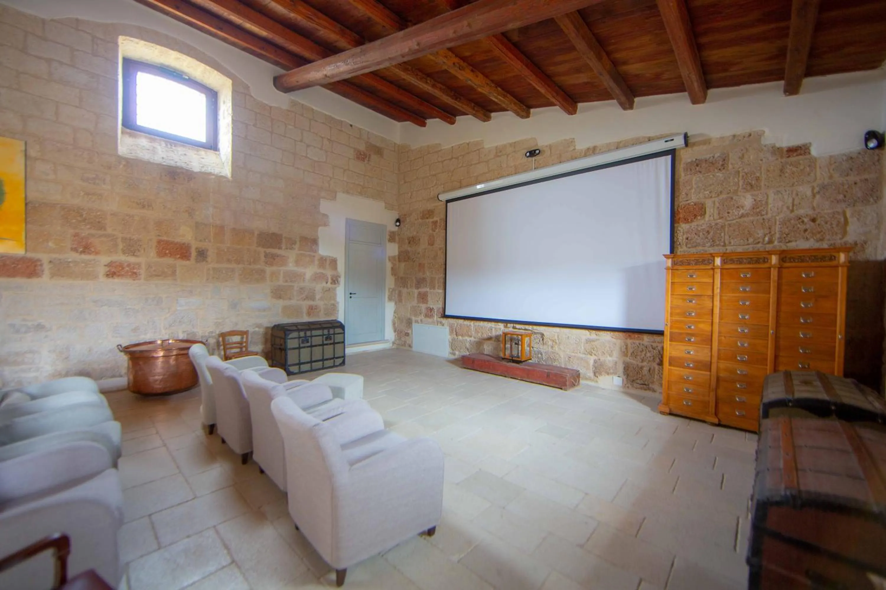 Communal lounge/ TV room in Lama Di Luna Biomasseria