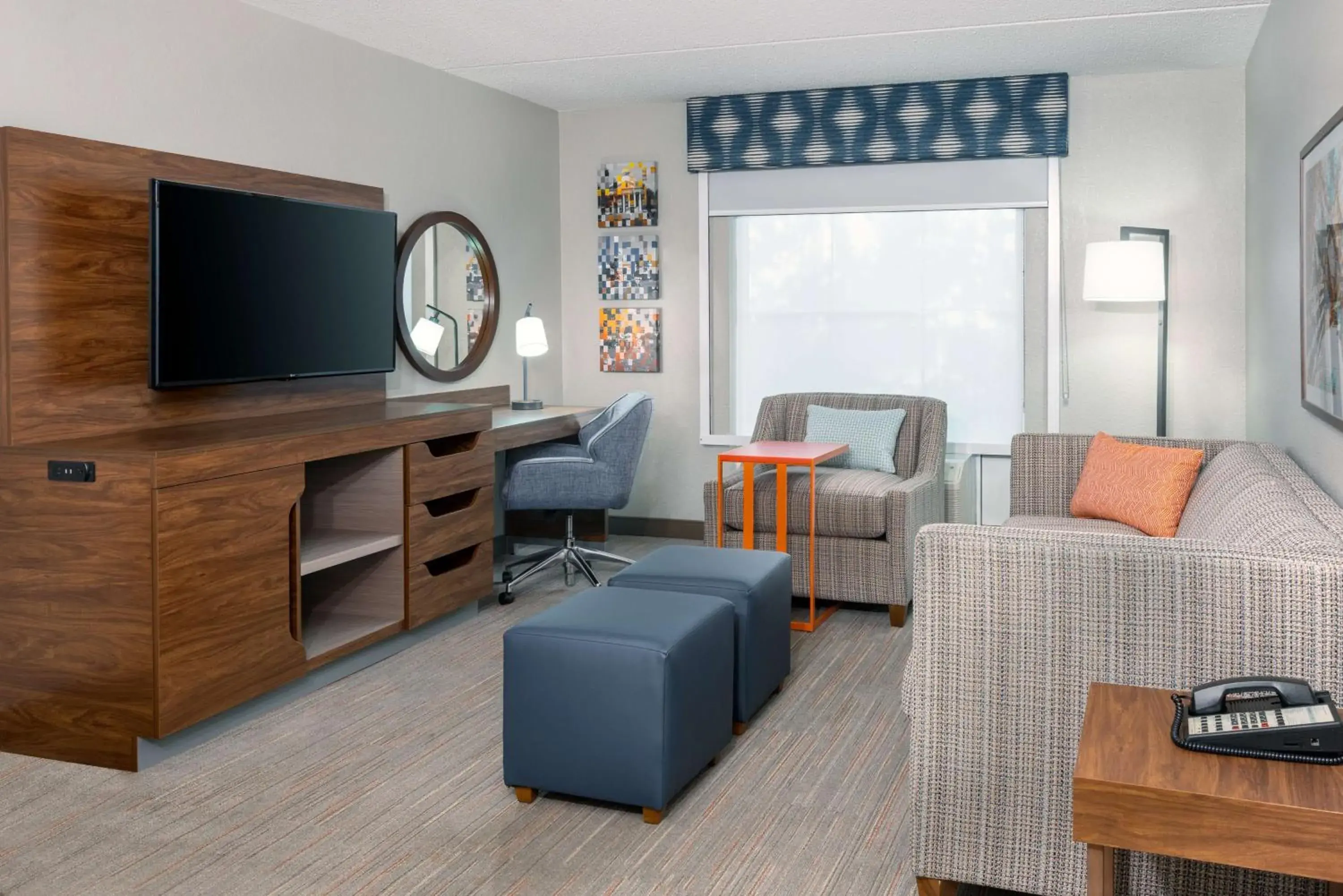 Living room in Hampton Inn & Suites Charlottesville at the University Living room in Hampton Inn & Suites Charlottesville at the University