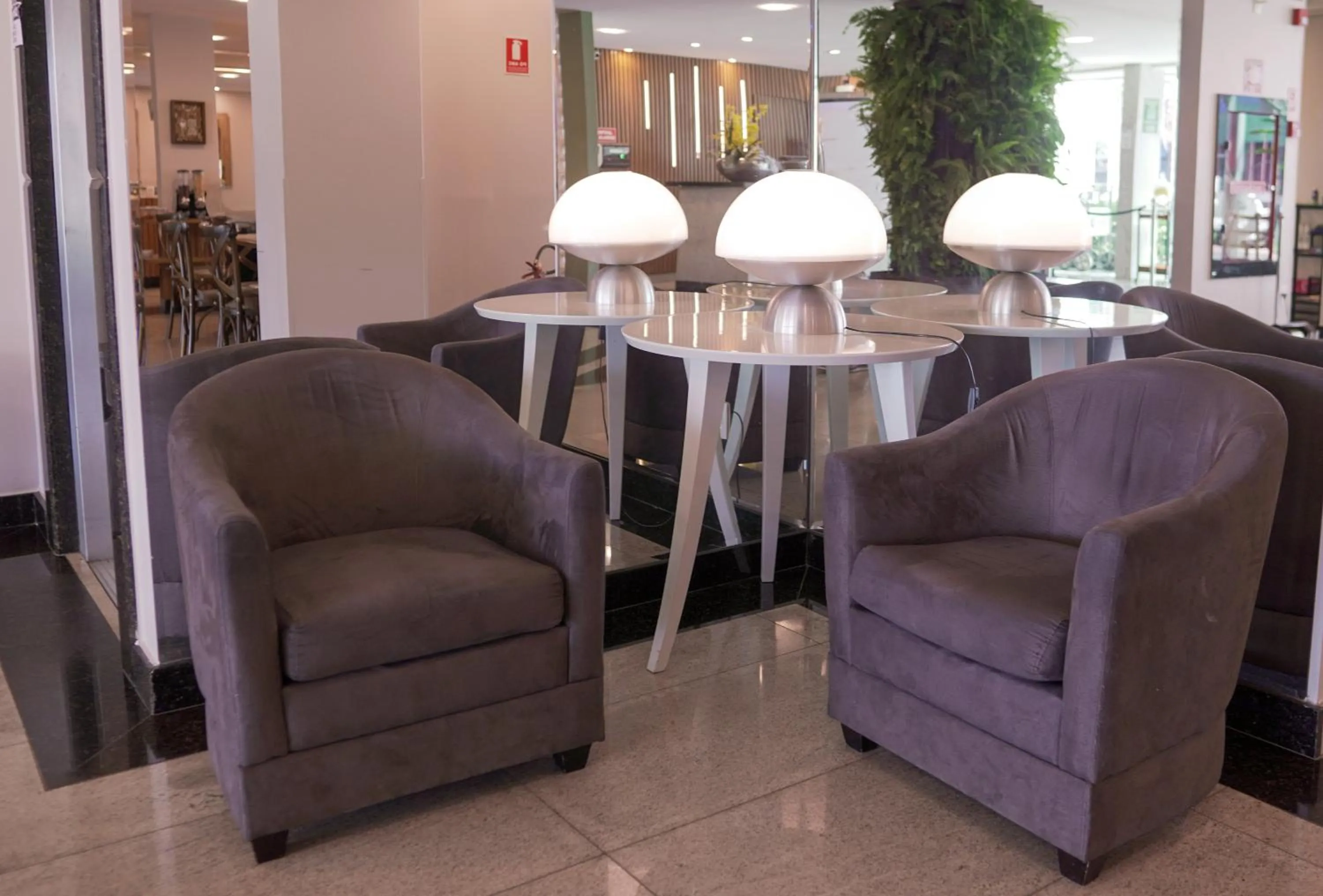 Lobby or reception in Castelo Inn Hotel