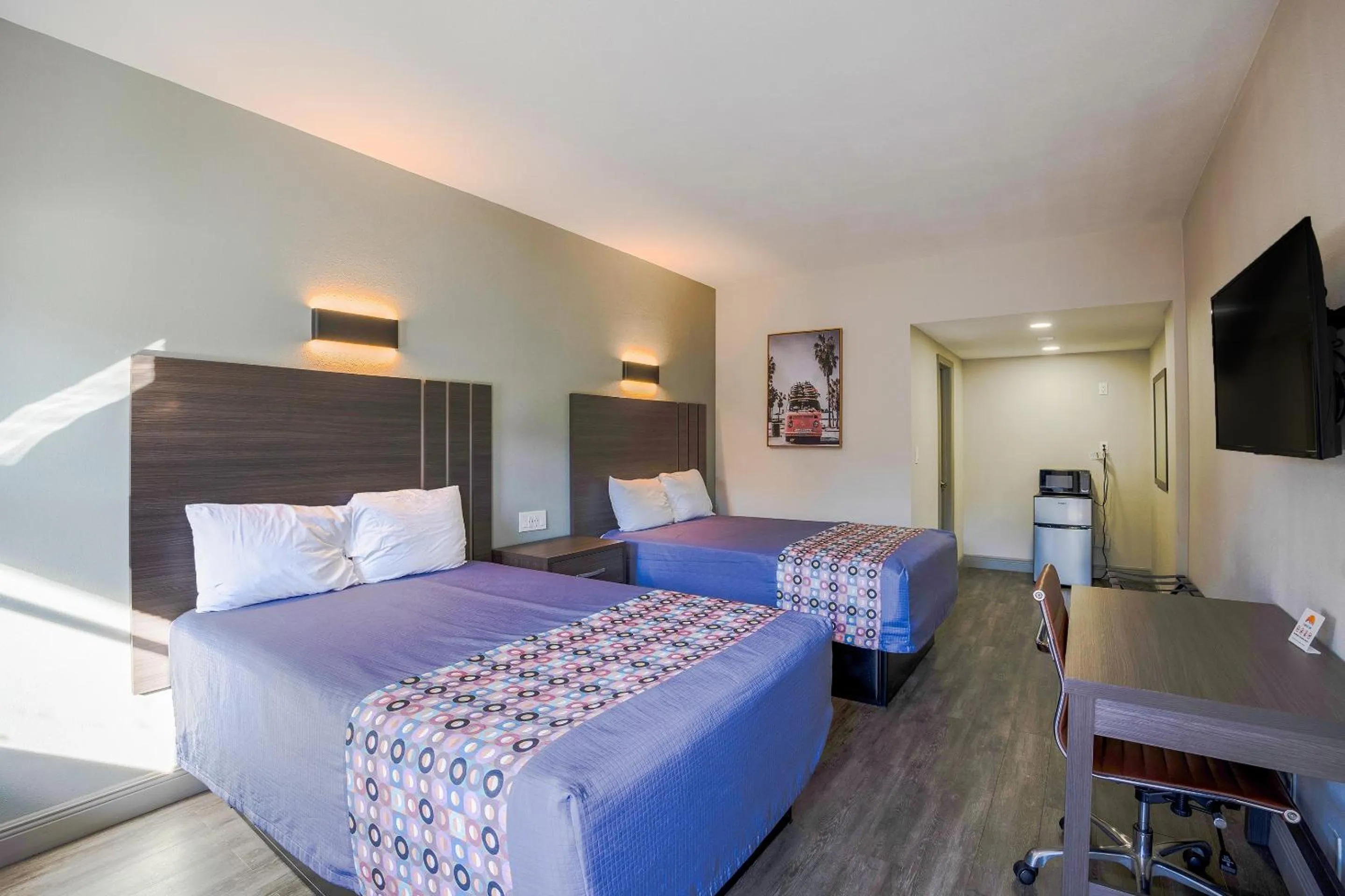 Bedroom, Bed in Sunrise Inn by OYO Titusville FL