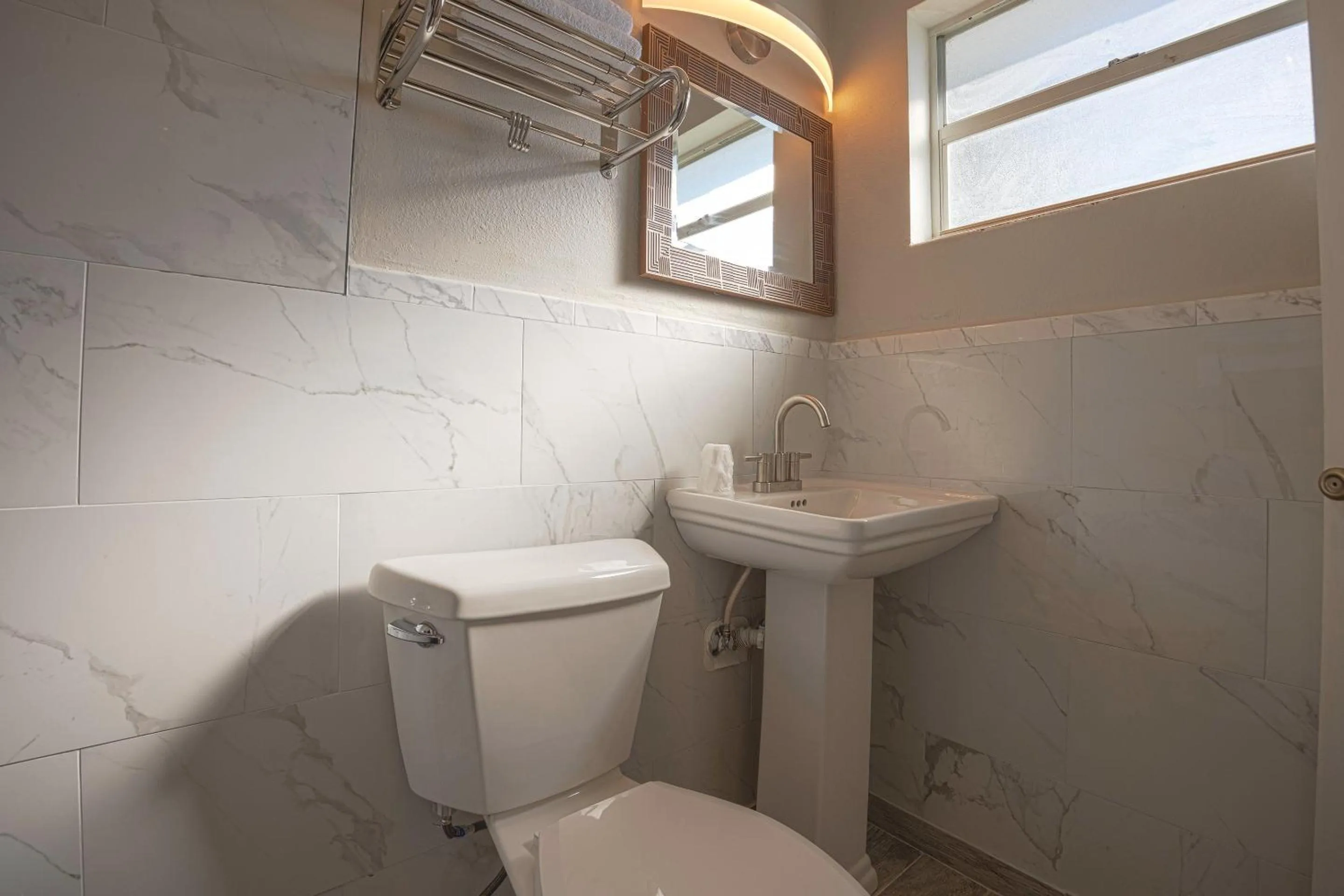 Bathroom in Sunrise Inn by OYO Titusville FL