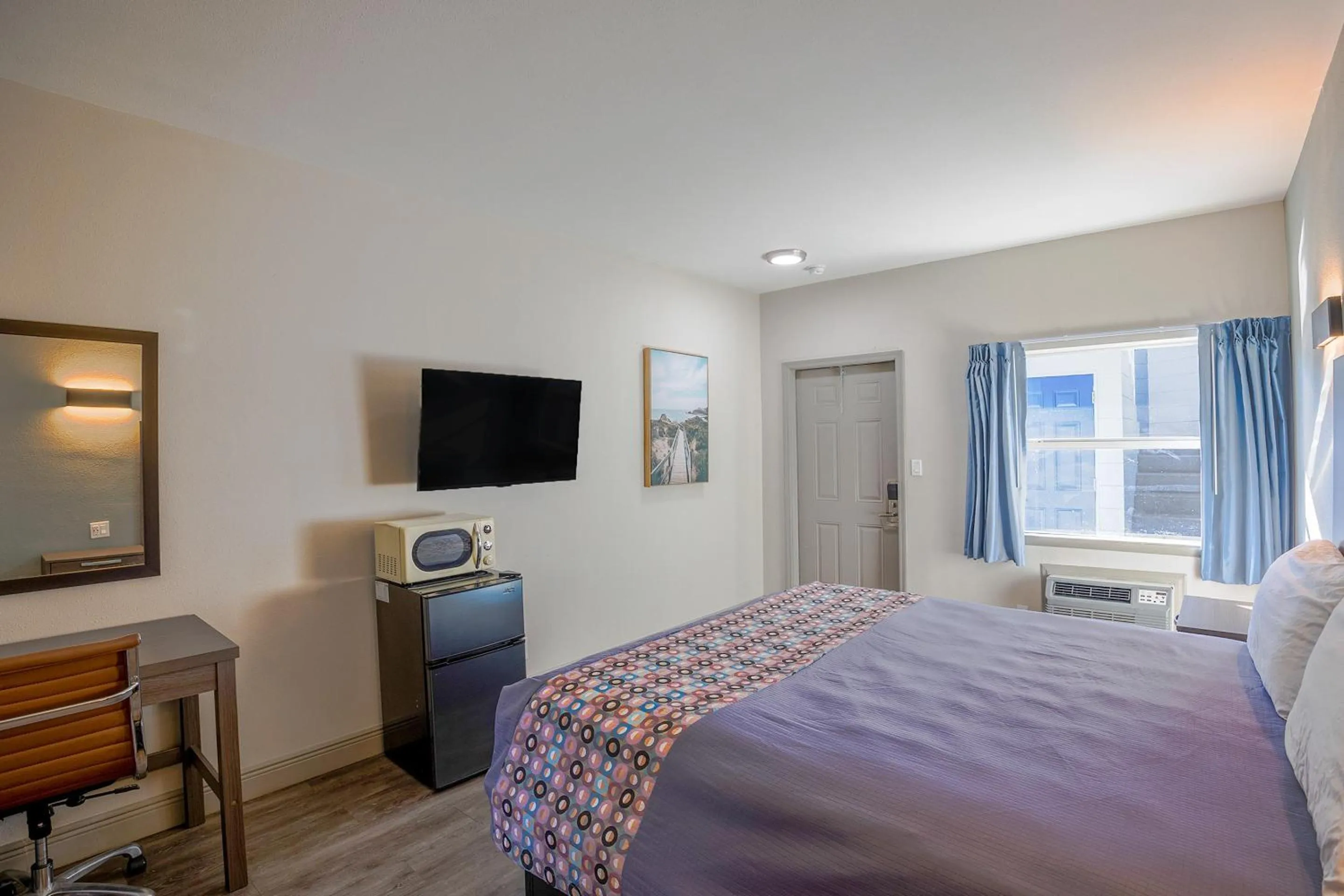 Bedroom, Bed in Sunrise Inn by OYO Titusville FL