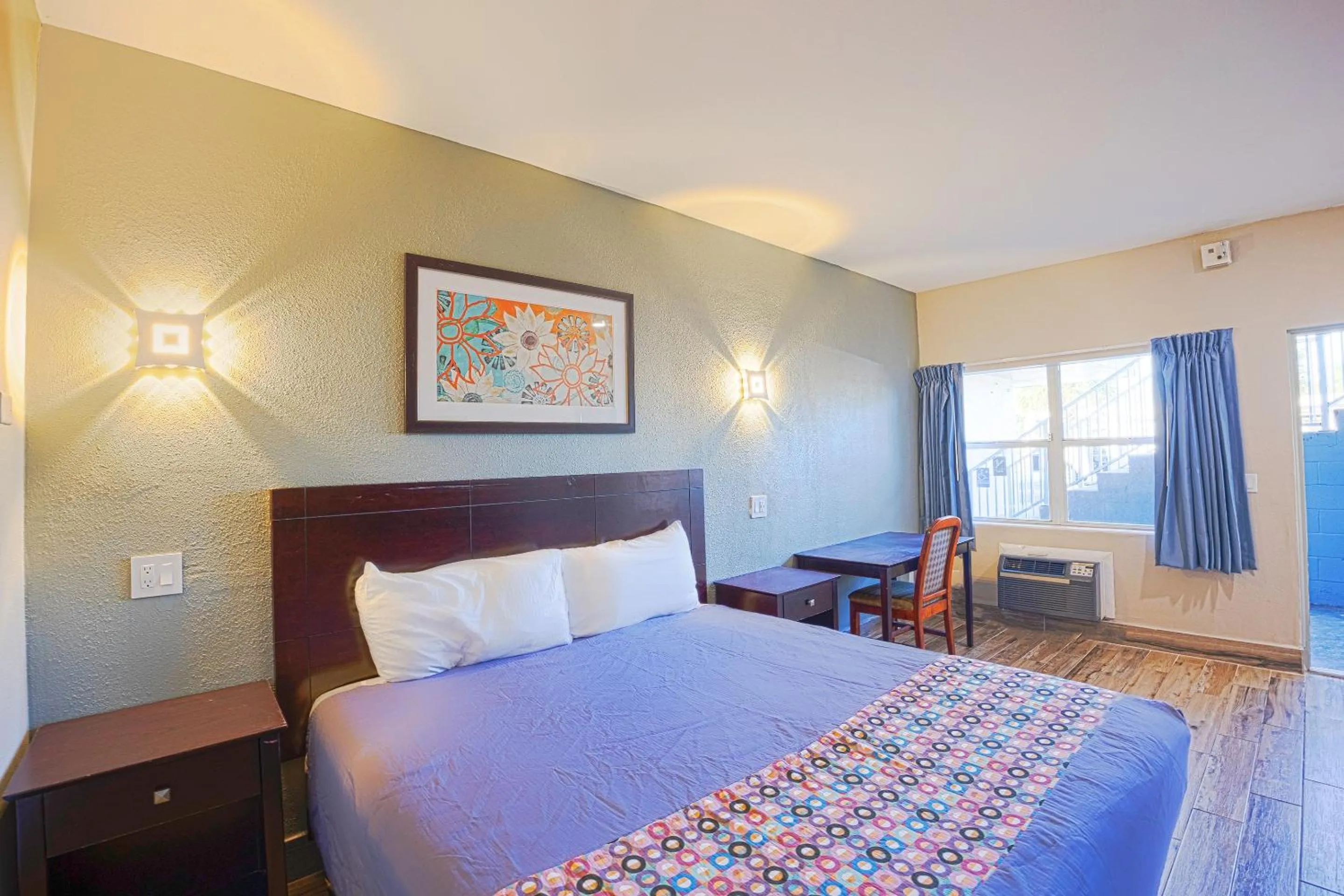 Bedroom, Bed in Sunrise Inn by OYO Titusville FL