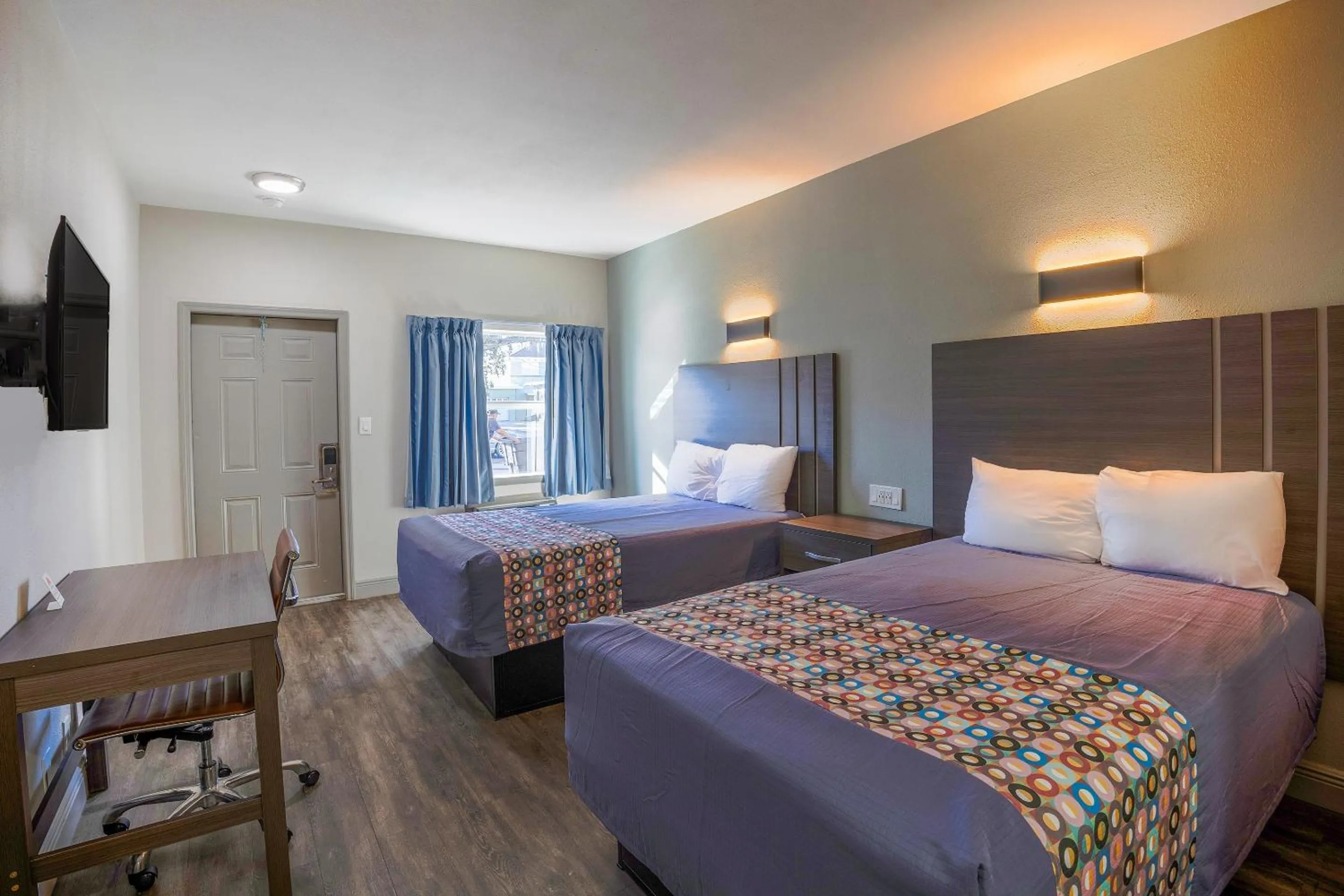 Bedroom, Bed in Sunrise Inn by OYO Titusville FL