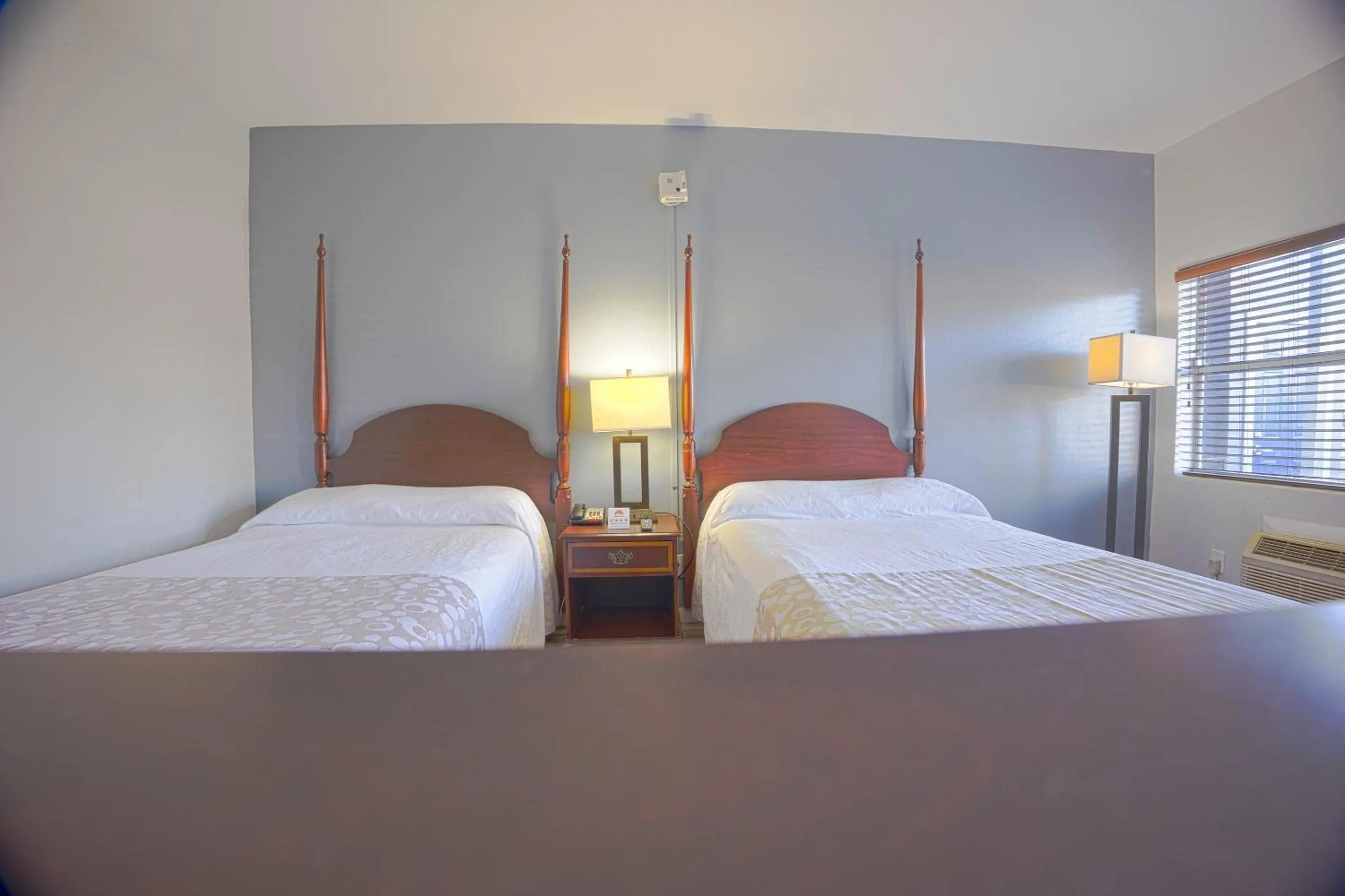 Bedroom, Bed in Sunrise Inn by OYO Titusville FL