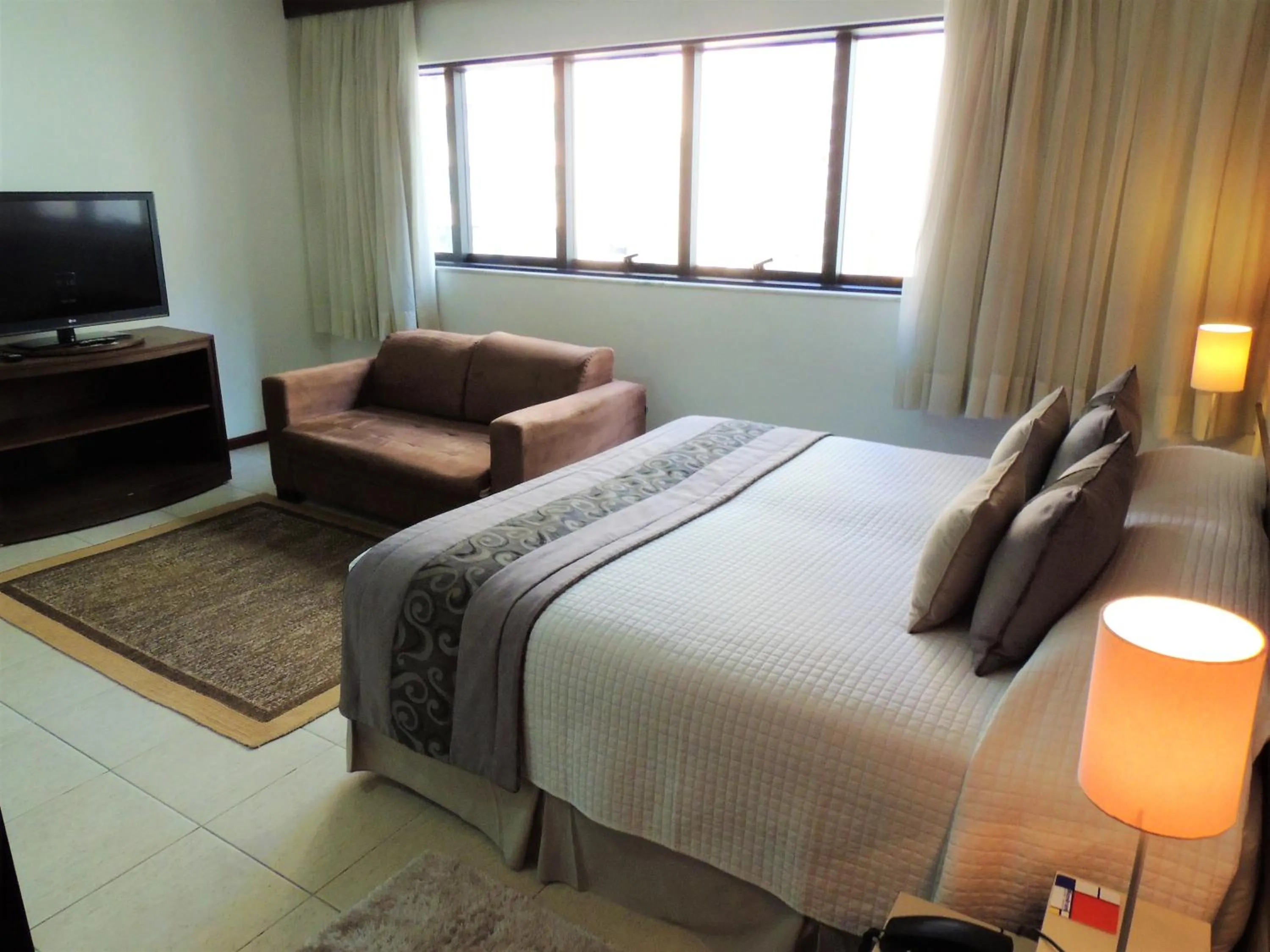 Bed in Mondrian Suite Hotel