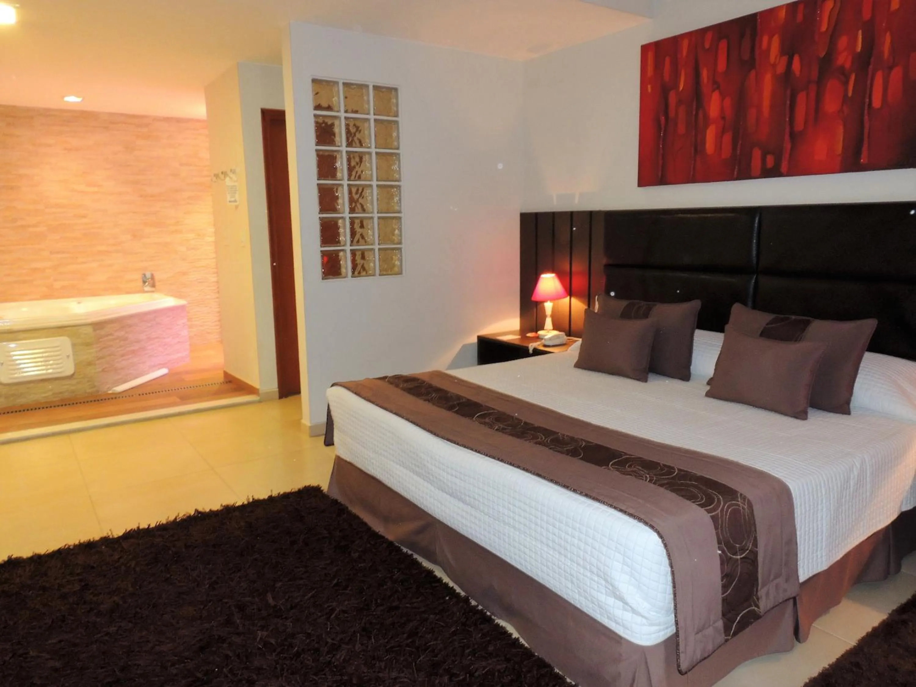 Bed in Mondrian Suite Hotel